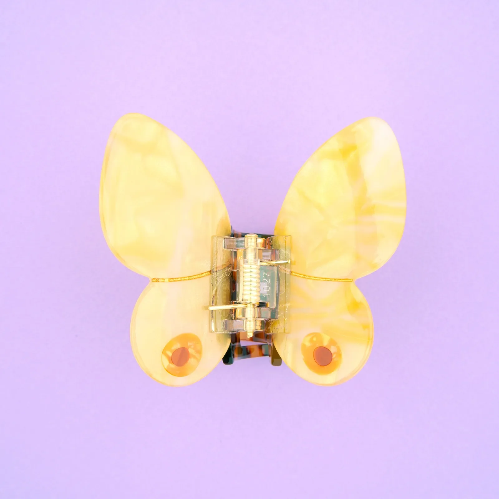 Coucou Suzette Yellow Butterfly Hair Claw in glossy cellulose acetate, a cheerful nature-inspired French hair accessory curated by Goosebump.
