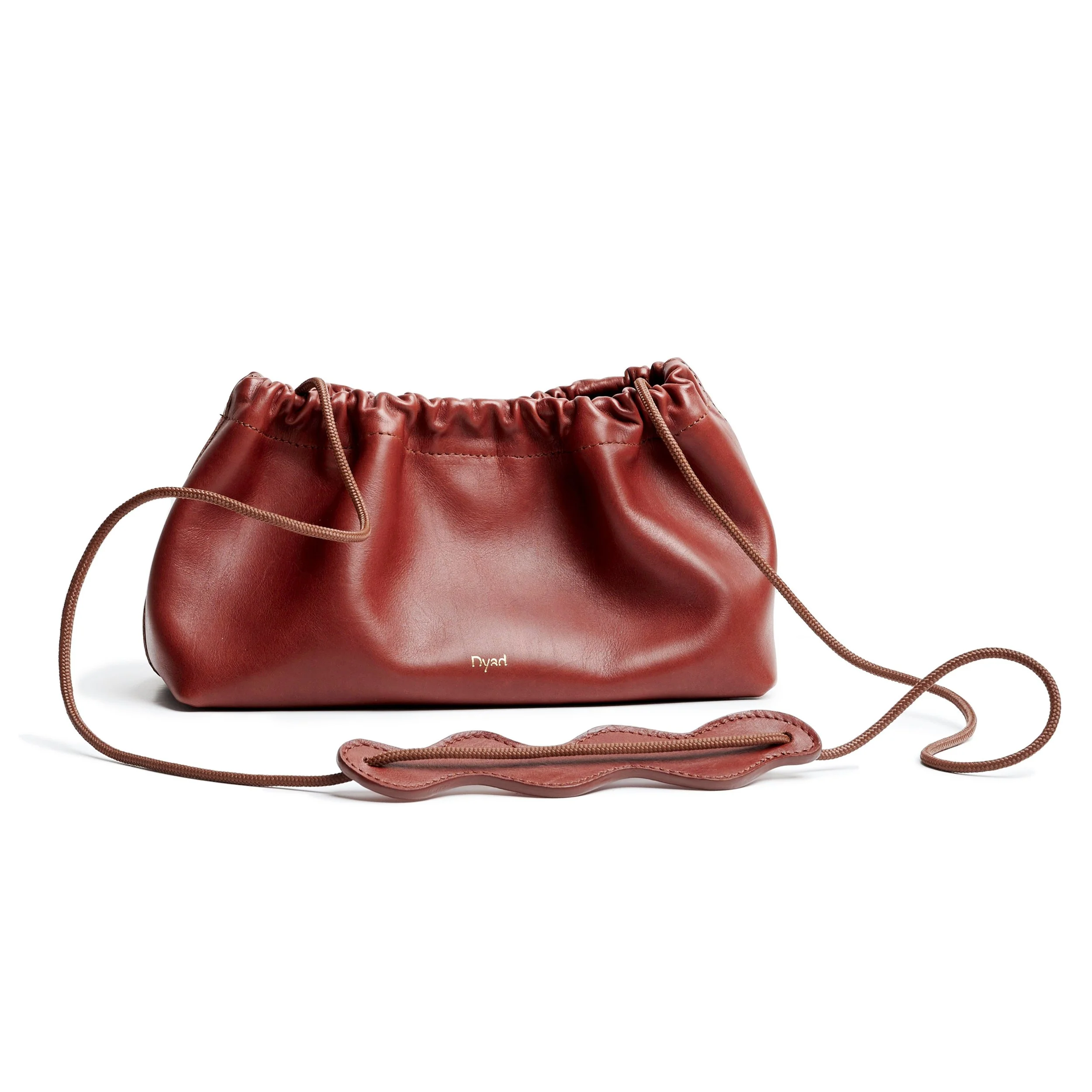 Wave Bag in teak brown canvas, curved fold design with short handles and soft lining, handmade by Project Dyad in South Africa.