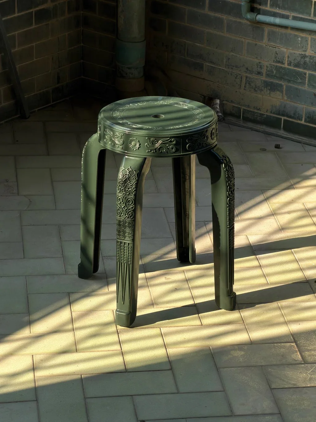 RUMBA BOR Buabok green woven stool inspired by Thai Centella herb, suitable for small Hong Kong homes.