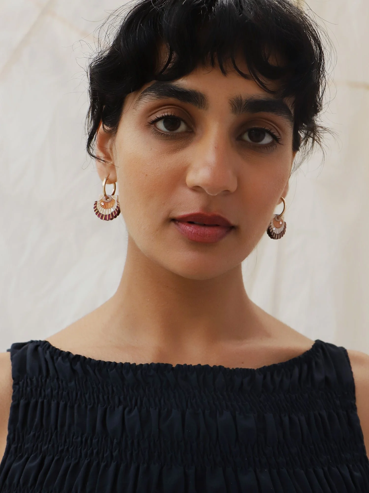 Wolf & Moon Scallop Shell Hoops with peach and cream scallop shell charms, acrylic and wood construction, glass crystal details and gold-filled hoops.