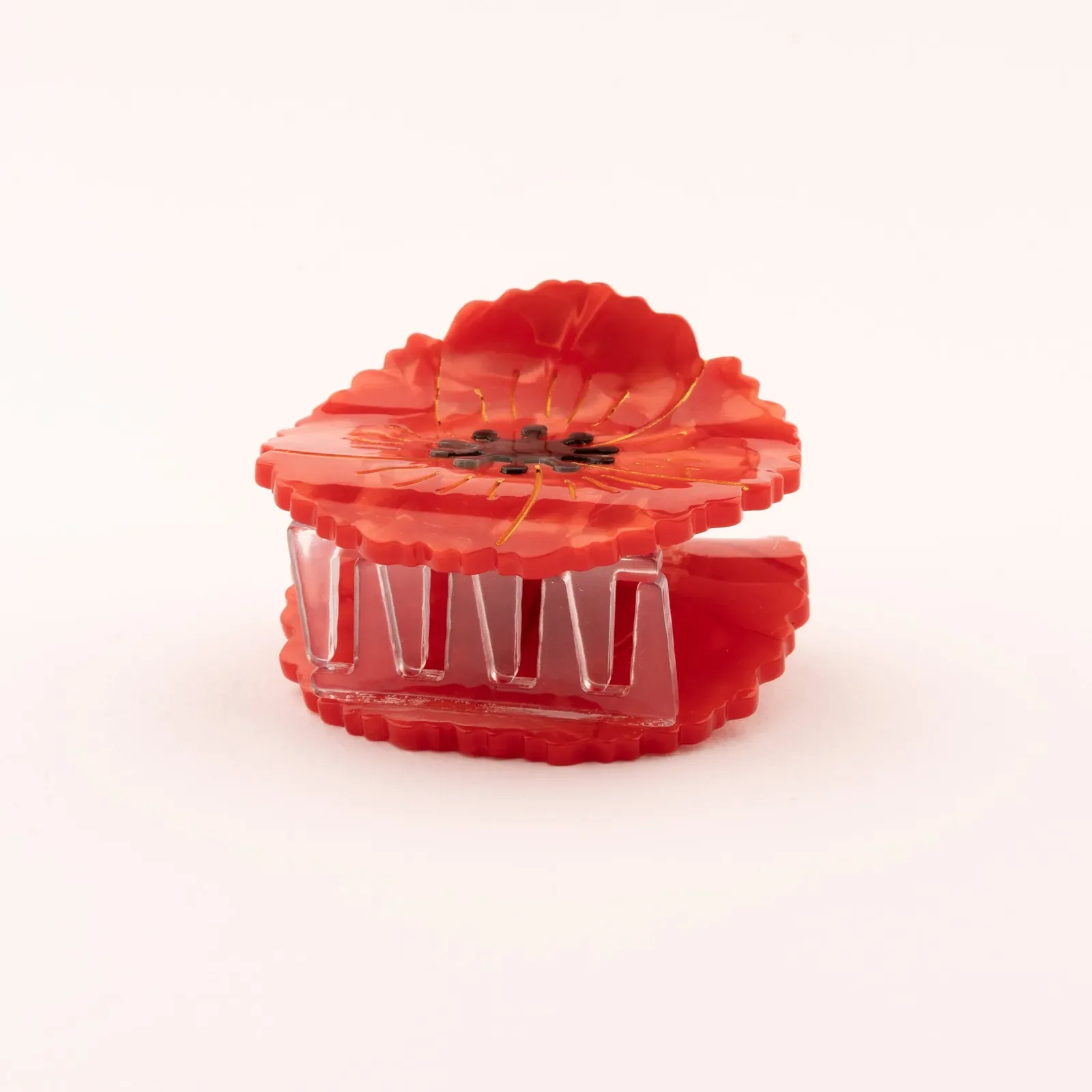 Coucou Suzette Poppy Hair Claw in glossy cellulose acetate, a vivid French flower hair accessory curated by Goosebump.