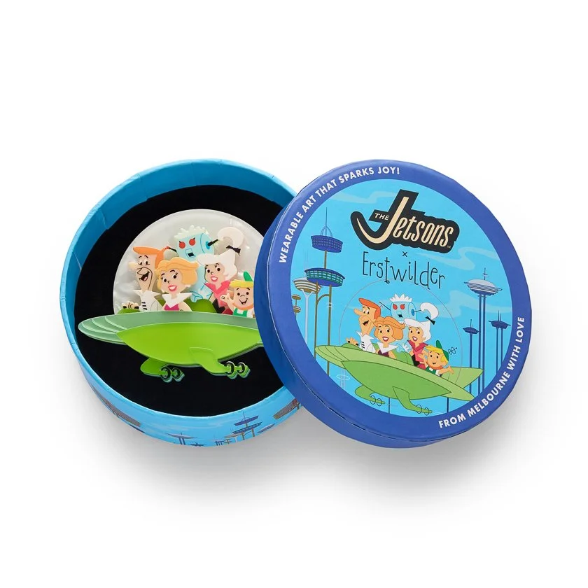 The Jetsons Aerocar brooch by Erstwilder, featuring a retro futuristic flying car design in layered resin, inspired by classic Hanna-Barbera animation.