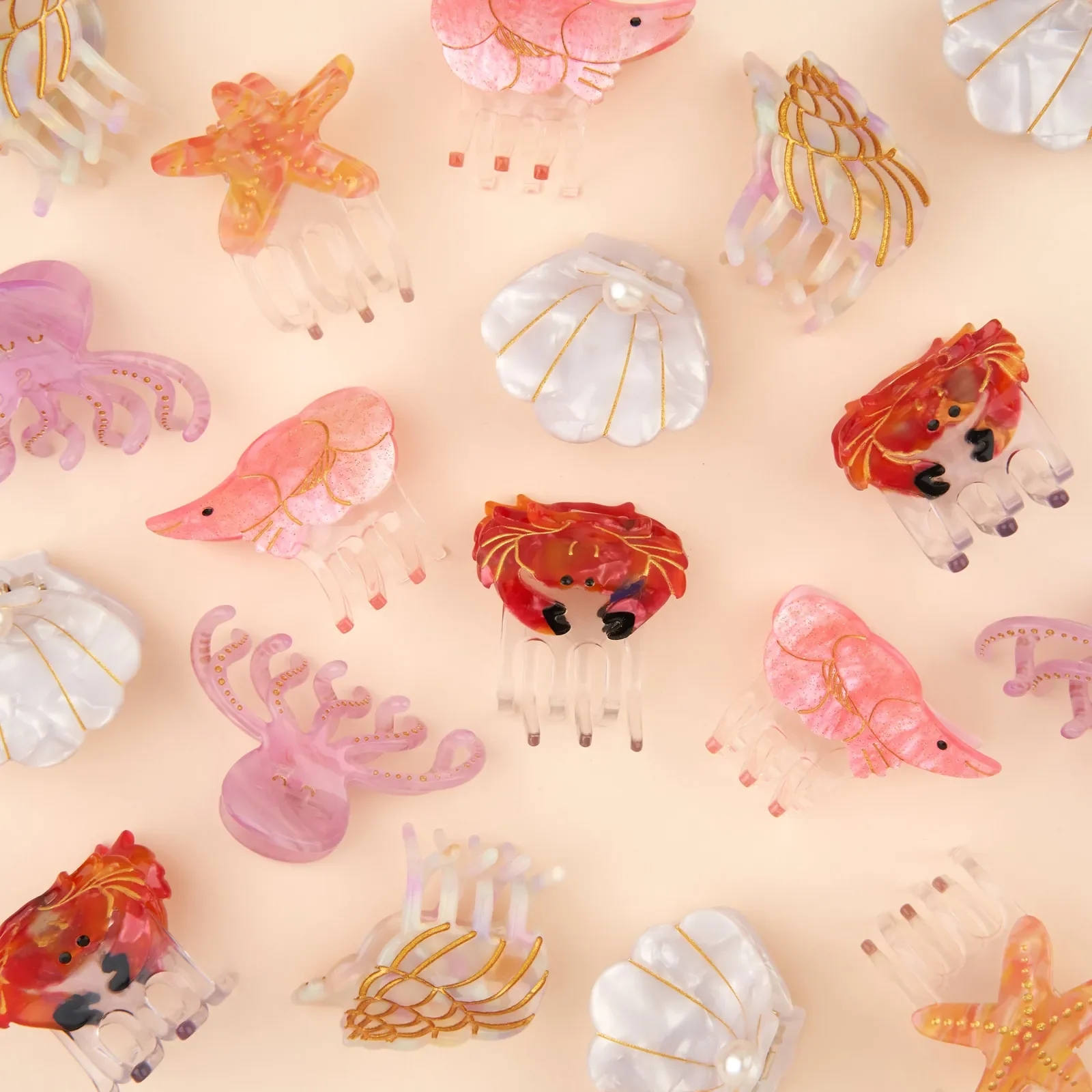 Coucou Suzette Mini Crab Hair Claw in glossy cellulose acetate, a quirky sea-inspired French hair accessory curated by Goosebump.