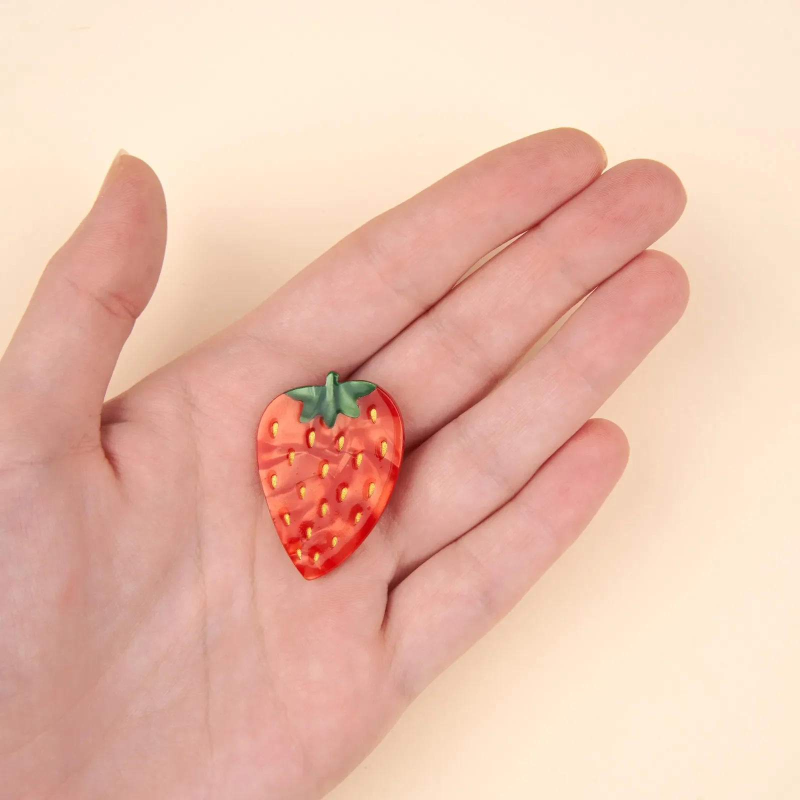 Coucou Suzette Strawberry Barrette in glossy cellulose acetate, a playful French fruit-inspired hair clip curated by Goosebump.