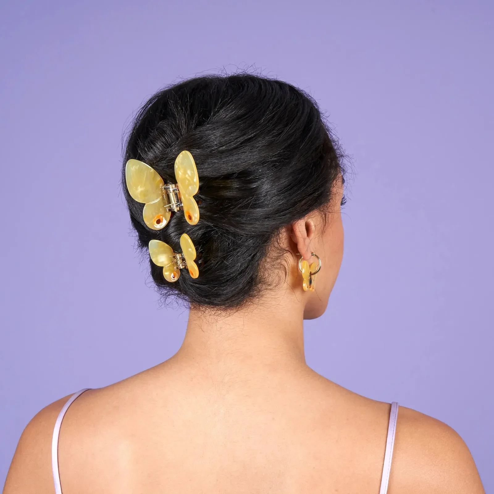 Coucou Suzette Yellow Butterfly Hair Claw in glossy cellulose acetate, a cheerful nature-inspired French hair accessory curated by Goosebump.
