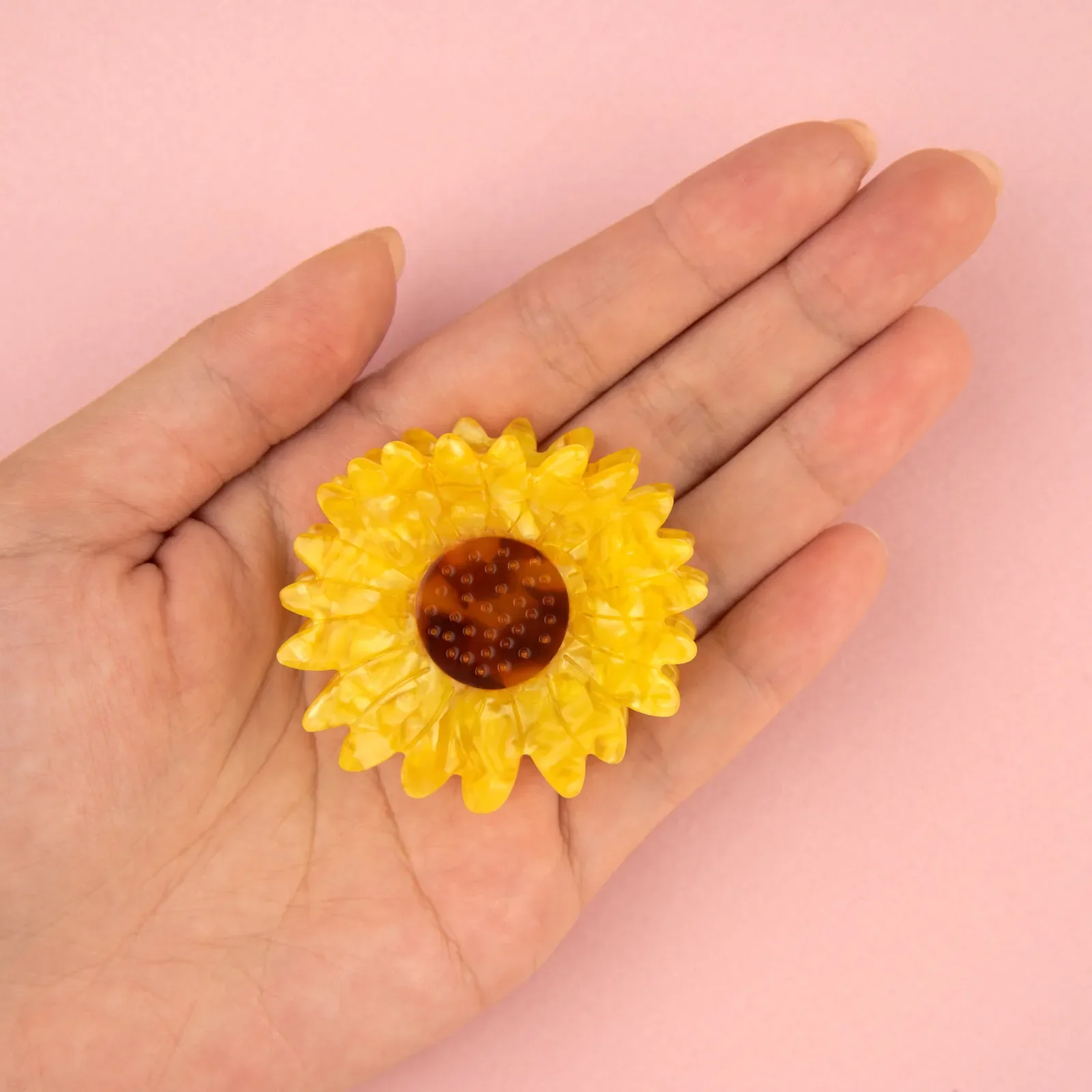 Coucou Suzette Sunflower Hair Claw in glossy cellulose acetate, a bright French flower hair accessory curated by Goosebump.