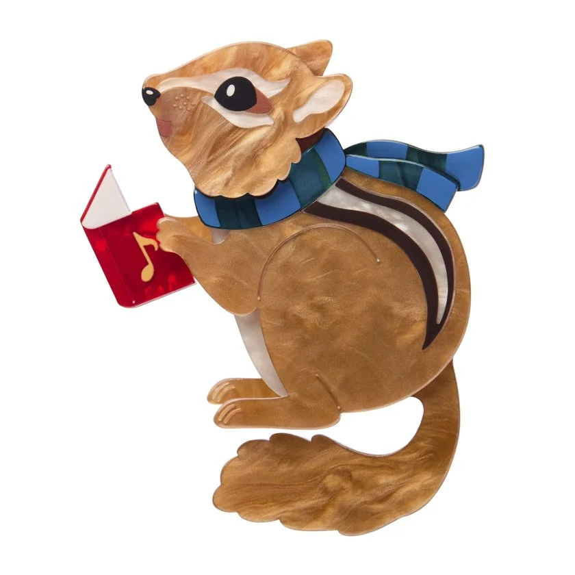 Erstwilder Charlie the Chipmunk Christmas brooch with scarf and carol book, layered resin design. Exclusive in Hong Kong at Goosebump.
