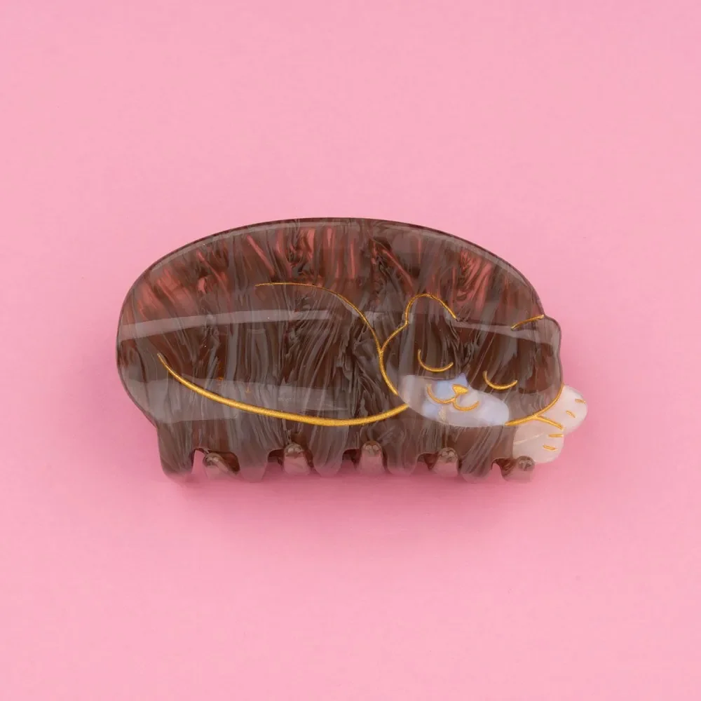 Sleeping cat hair claw by Coucou Suzette in glossy cellulose acetate.