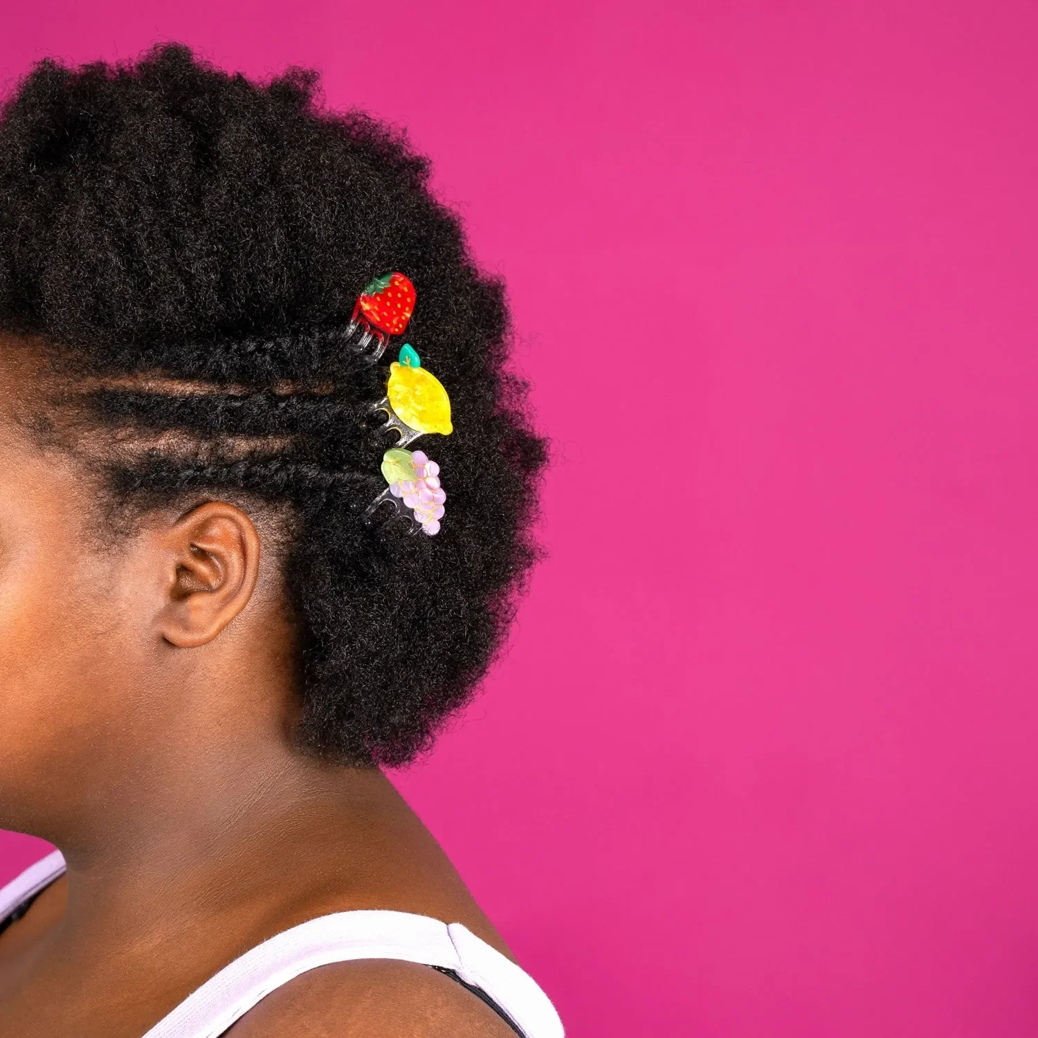 Coucou Suzette Mini Strawberry Hair Claw in glossy cellulose acetate, a playful French fruit-inspired hair accessory curated by Goosebump.