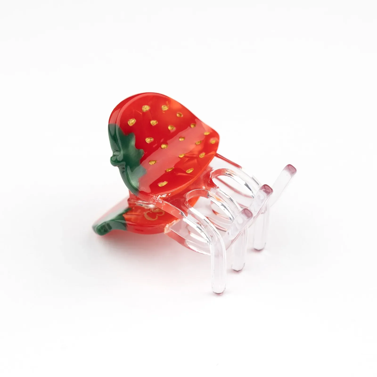 Coucou Suzette Mini Strawberry Hair Claw in glossy cellulose acetate, a playful French fruit-inspired hair accessory curated by Goosebump.