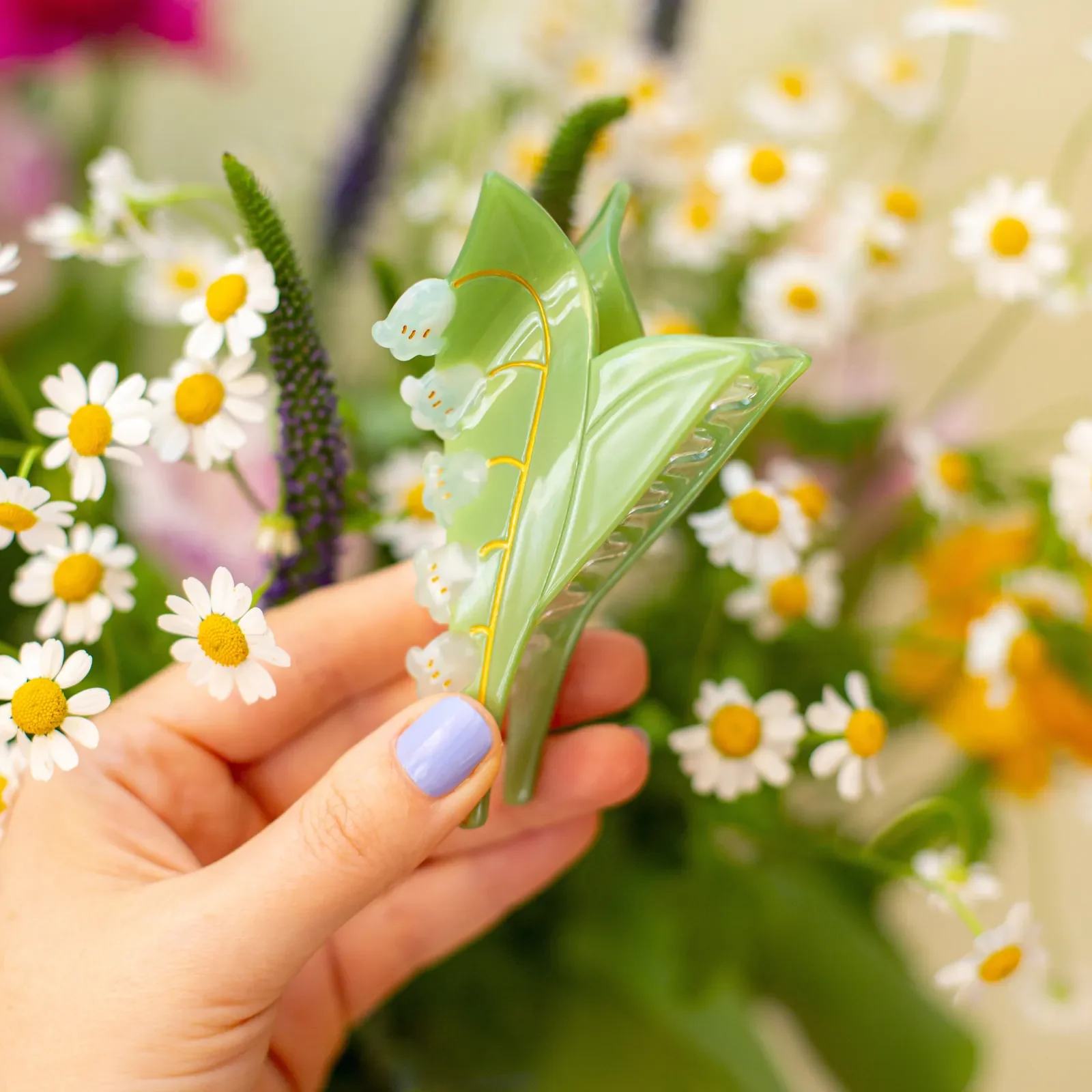 Coucou Suzette Lily of the Valley Hair Claw in glossy cellulose acetate, a delicate French flower hair accessory curated by Goosebump.