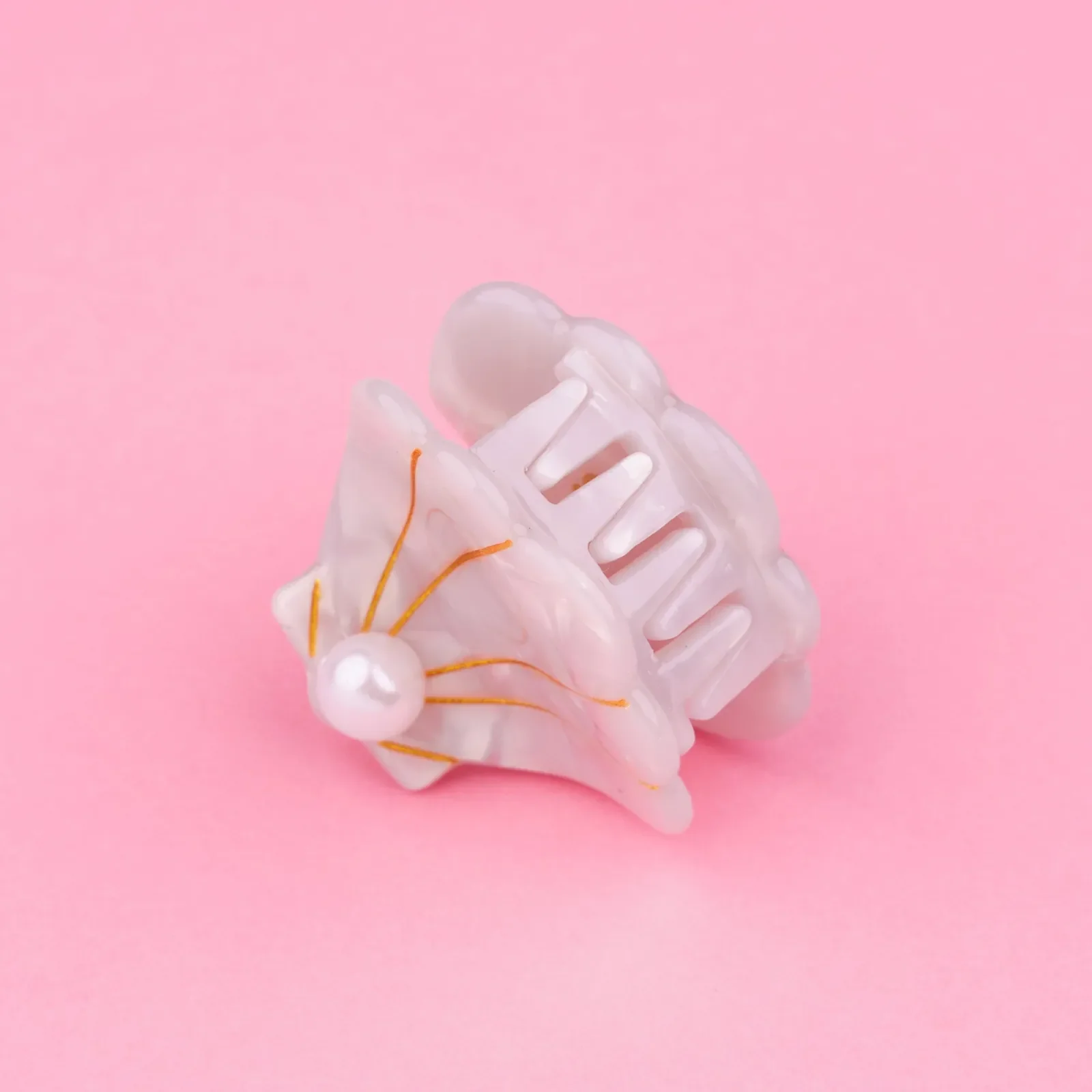 Coucou Suzette Poppy Hair Claw in glossy cellulose acetate, a vivid French flower hair accessory curated by Goosebump.