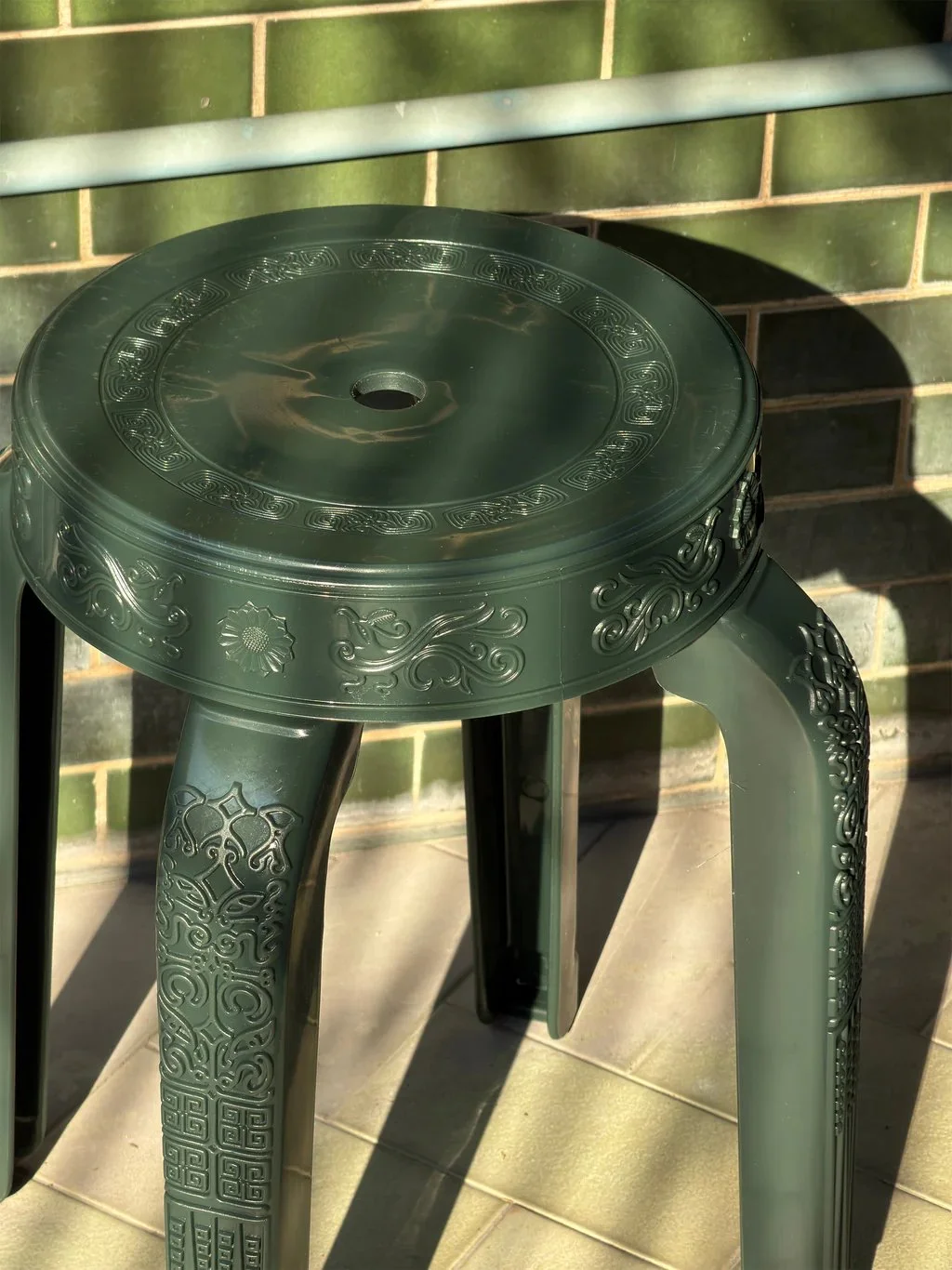 RUMBA BOR Buabok green woven stool inspired by Thai Centella herb, suitable for small Hong Kong homes.