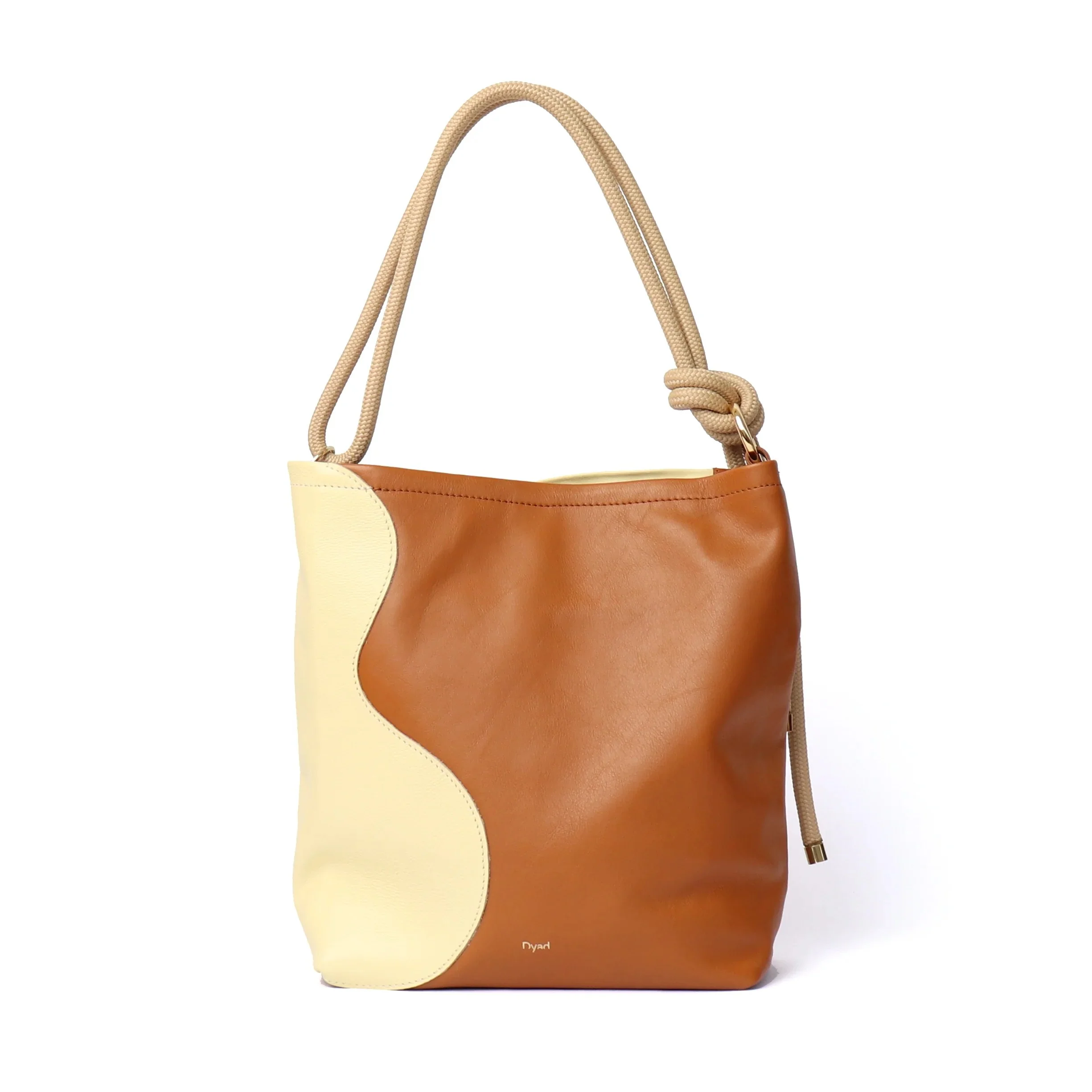 Tan and butter ripple canvas tote bag by Project Dyad, handmade with sculptural folds and cotton straps.