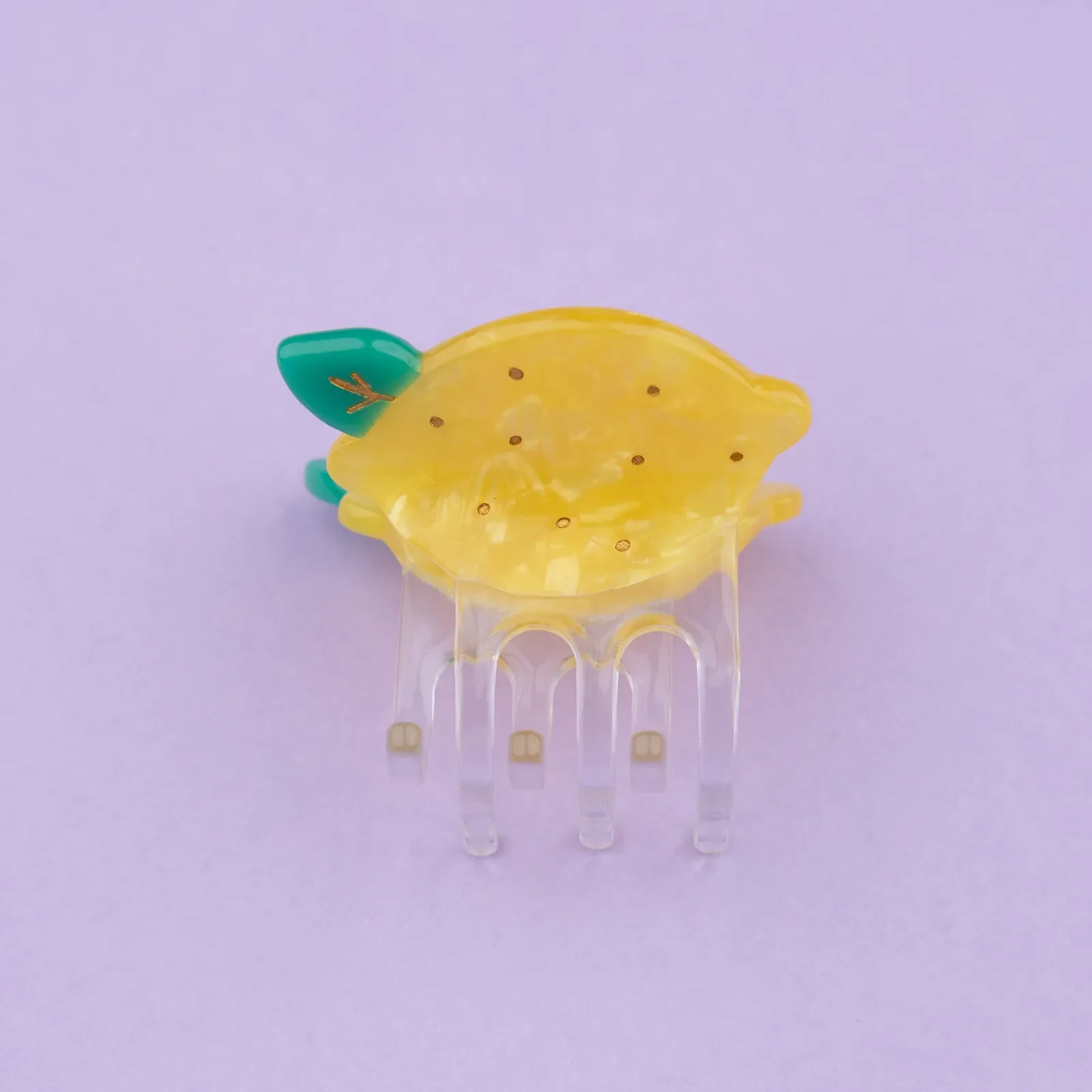 Discover Coucou Suzette Mini Lemon Hair Claw, a cheerful French fruit-inspired hair accessory in glossy cellulose acetate. A sweet little gift, curated by Goosebump in Hong Kong.