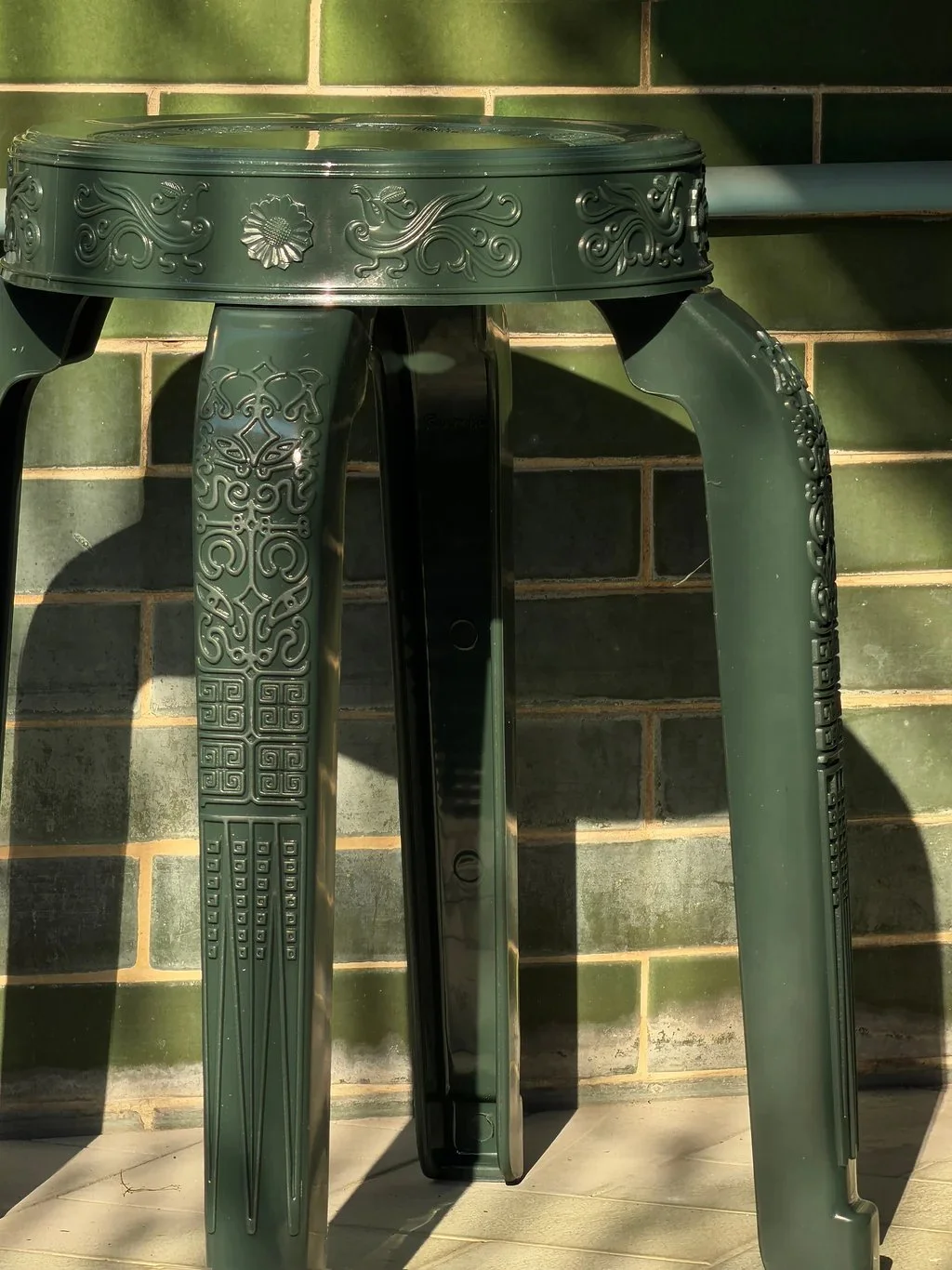 RUMBA BOR Buabok green woven stool inspired by Thai Centella herb, suitable for small Hong Kong homes.