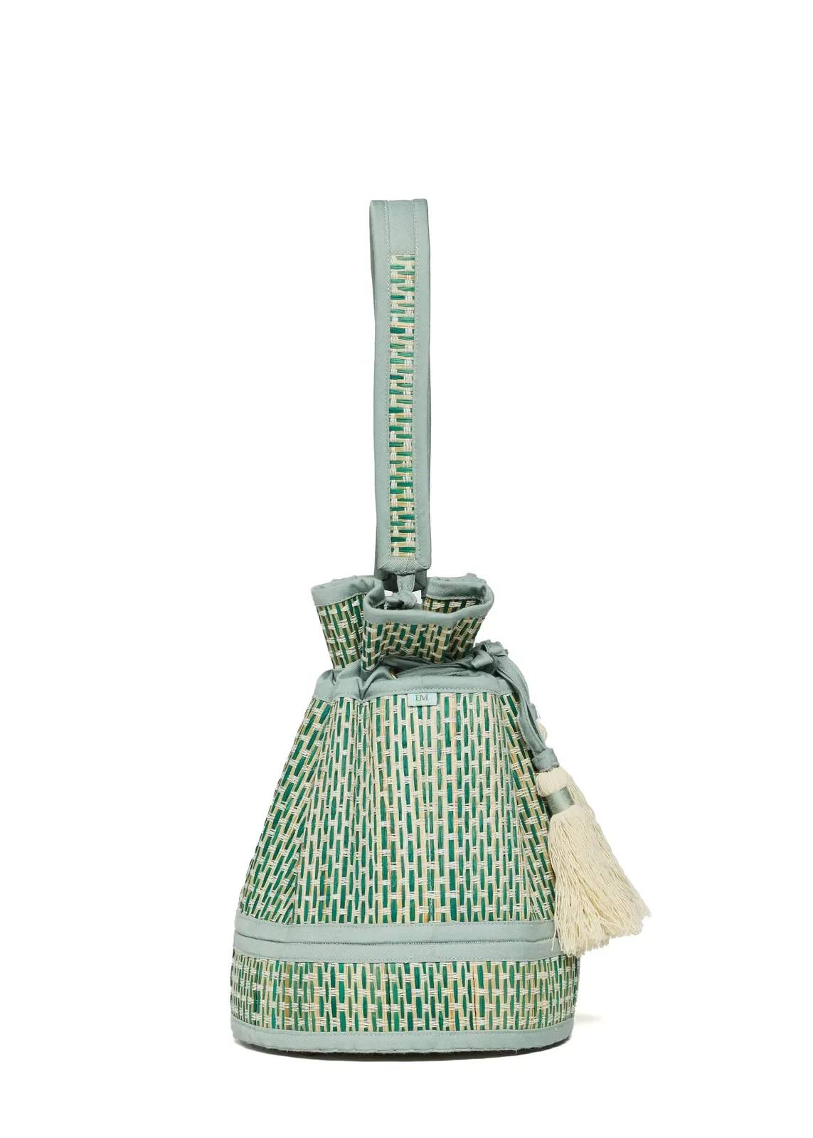 Angled back view of the Lorna Murray Fiji Mini Leisure Tote showcasing its handcrafted woven construction and structured drawstring design.