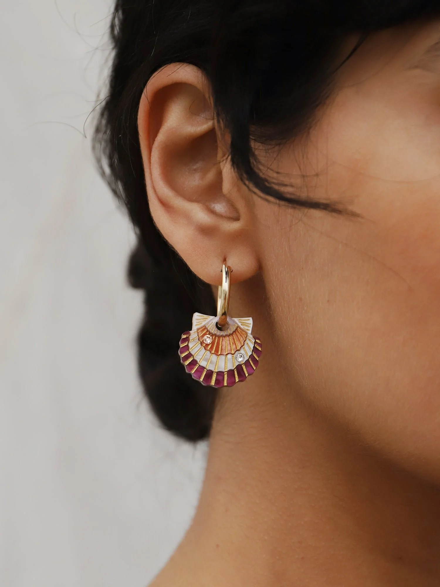 Wolf & Moon Scallop Shell Hoops with peach and cream scallop shell charms, acrylic and wood construction, glass crystal details and gold-filled hoops.