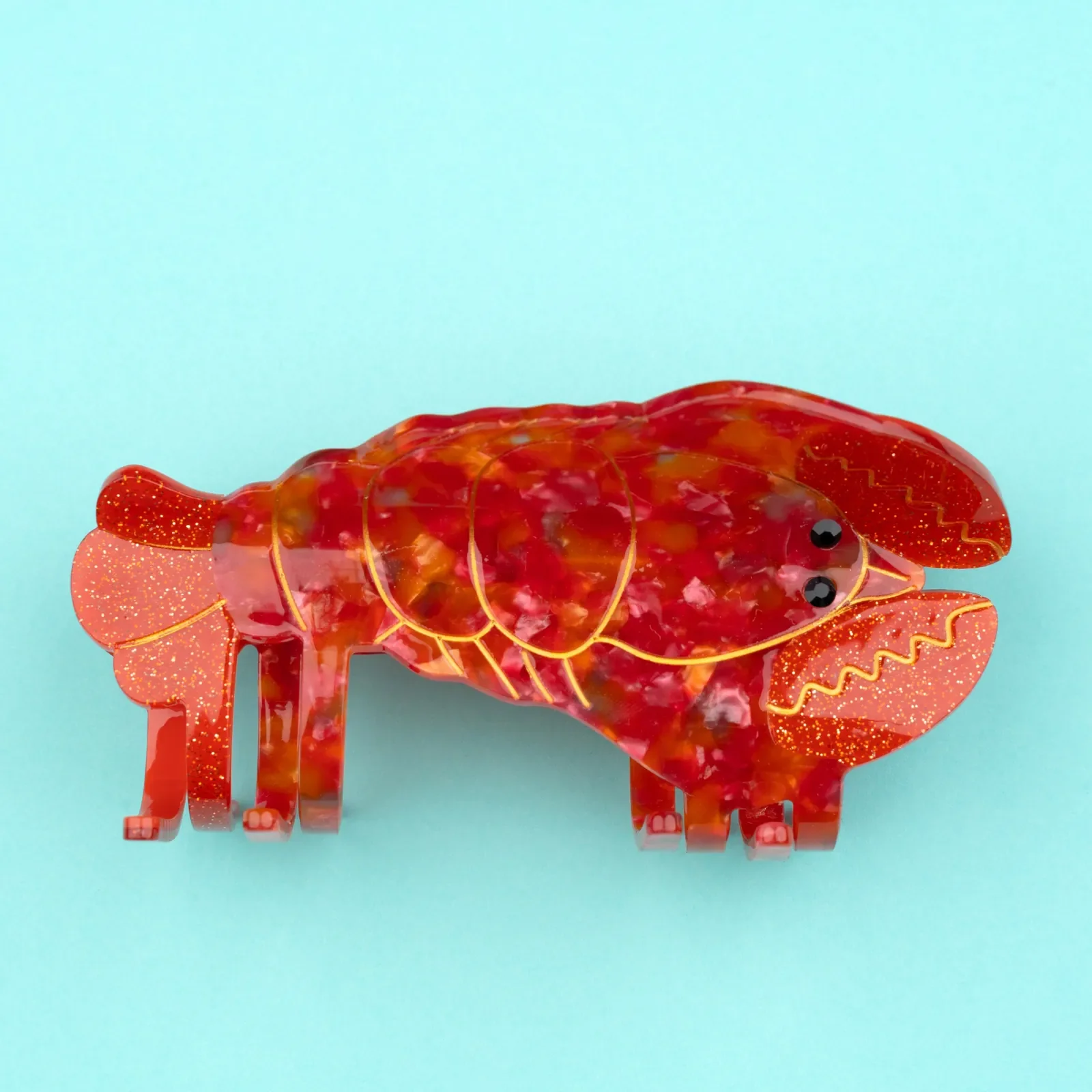 Coucou Suzette Lobster Hair Claw in glossy cellulose acetate, a bold sea-inspired French hair accessory curated by Goosebump.