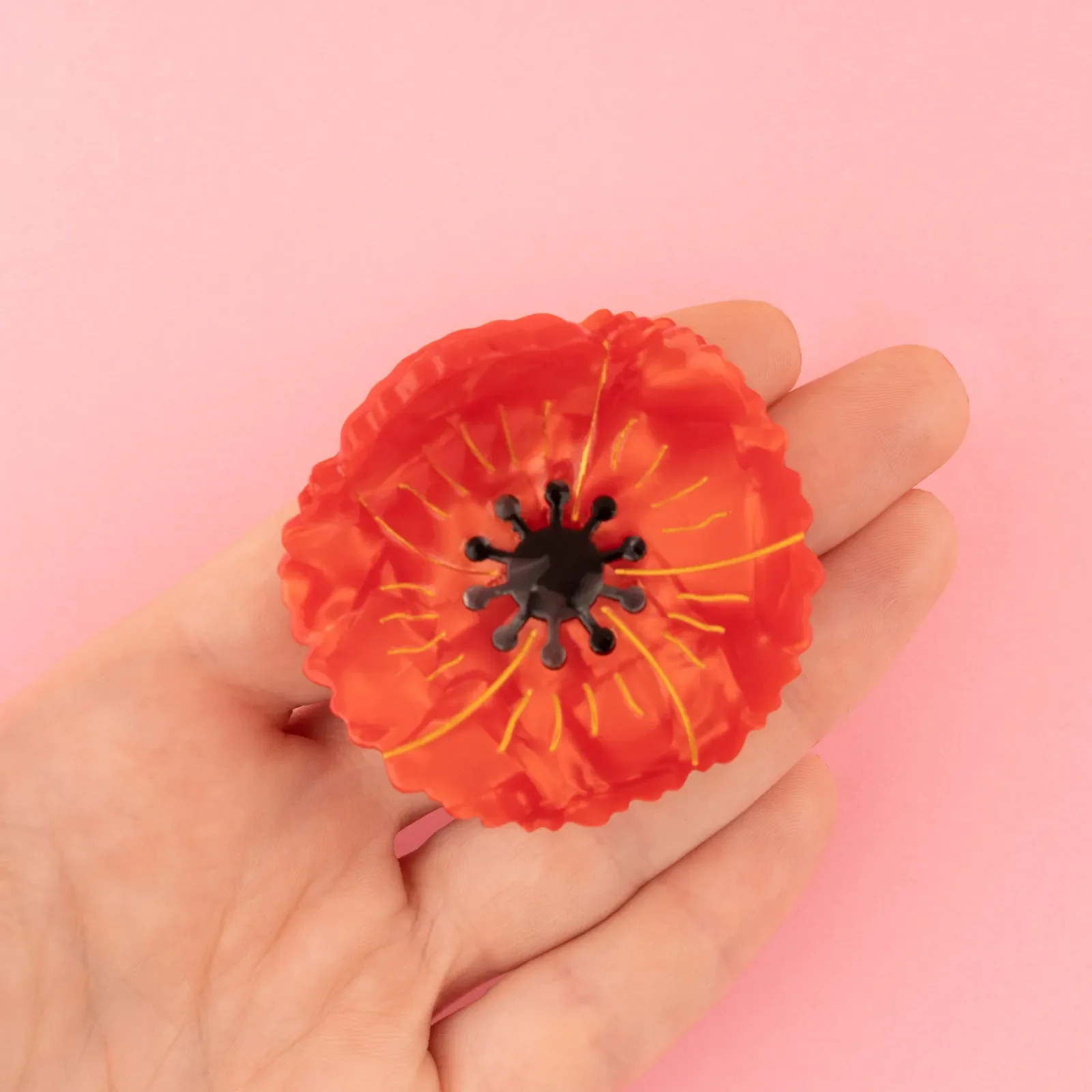 Coucou Suzette Poppy Hair Claw in glossy cellulose acetate, a vivid French flower hair accessory curated by Goosebump.