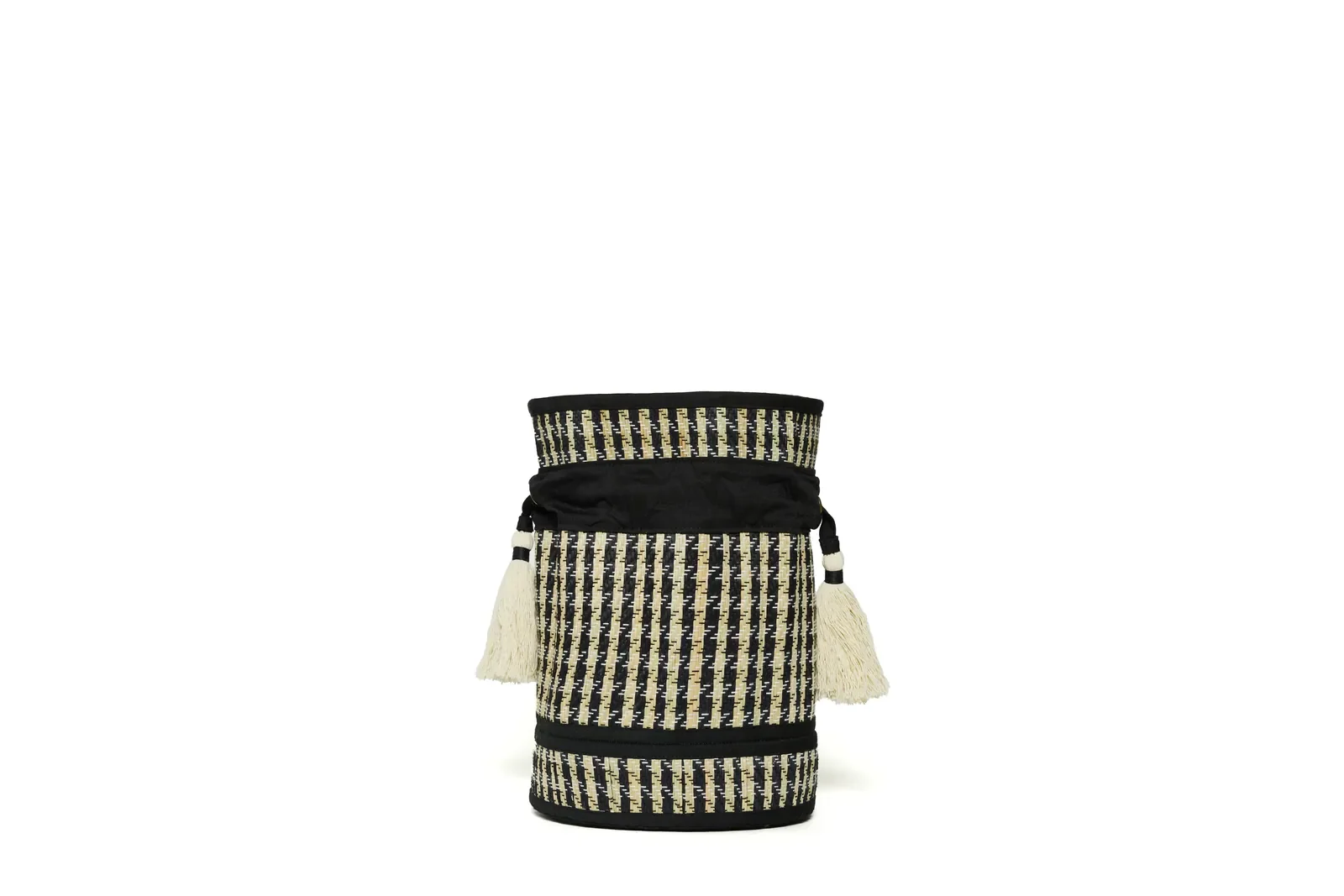 Back view of the Lorna Murray Roma Island Mini Leisure Tote featuring its handcrafted woven construction and cotton-blend trim.