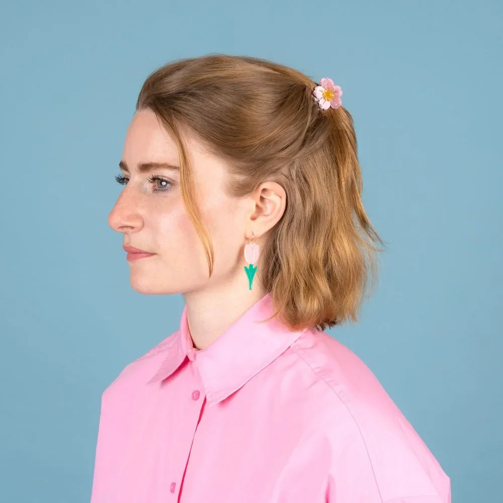 Coucou Suzette Mini Sakura Hair Claw in glossy cellulose acetate, a delicate French flower hair accessory curated by Goosebump.