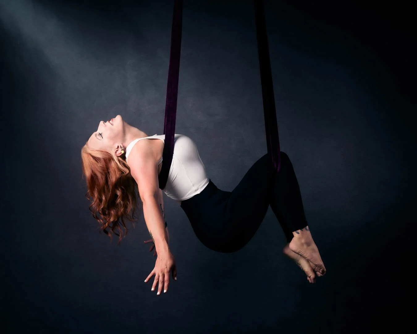 Atmospheric aerial straps portrait for Surrey Circus Centre