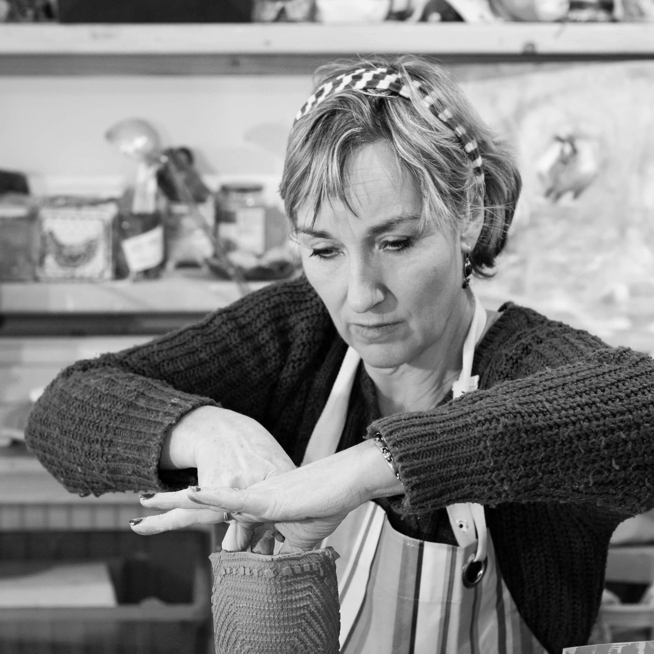 Potter making a vase with clay - image featured in Heritage Photographer of the Year 2015 by Sian Tyrrell