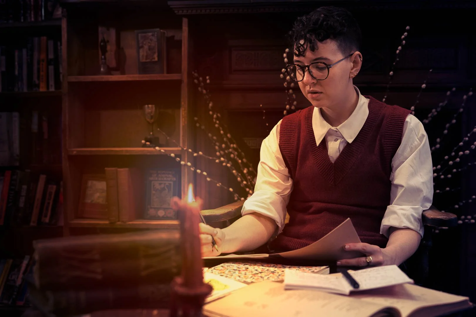 Magical author portrait in library by Snake, Star & Skull Photography