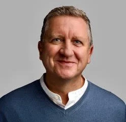 A Head Shot of Paul, a smart looking mid-life gent