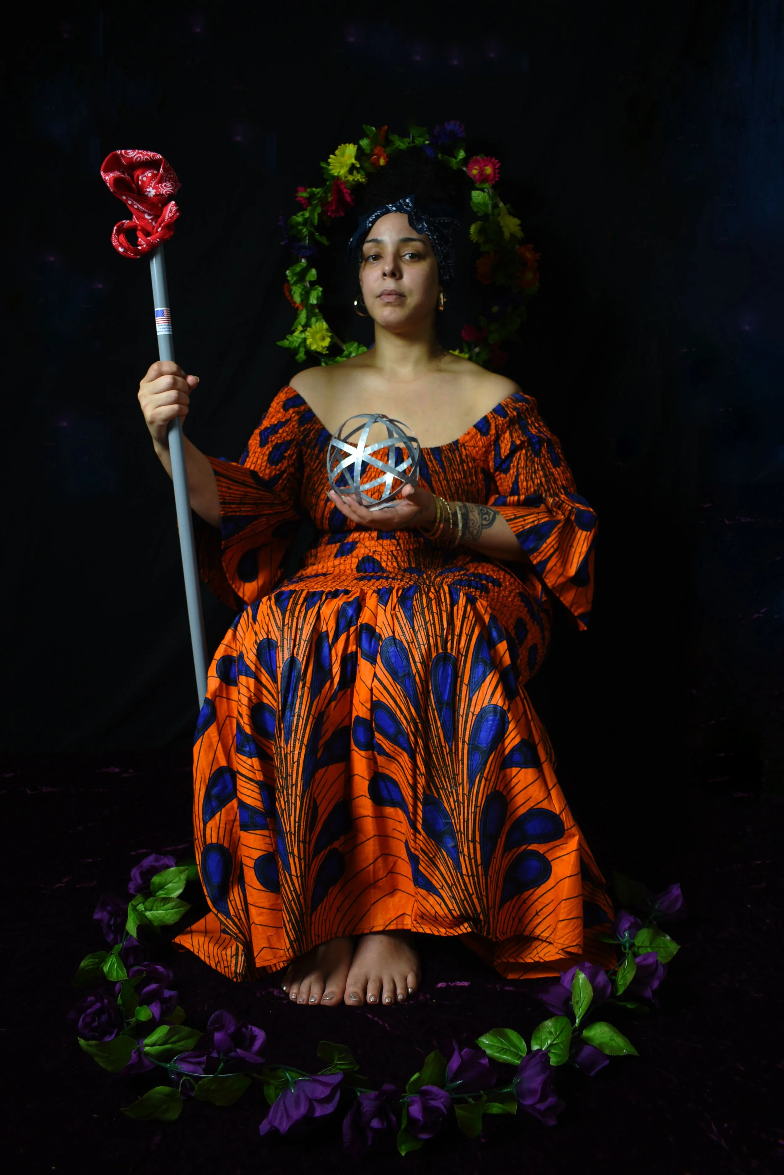 Adaella siting with a stick and a globe.jpg