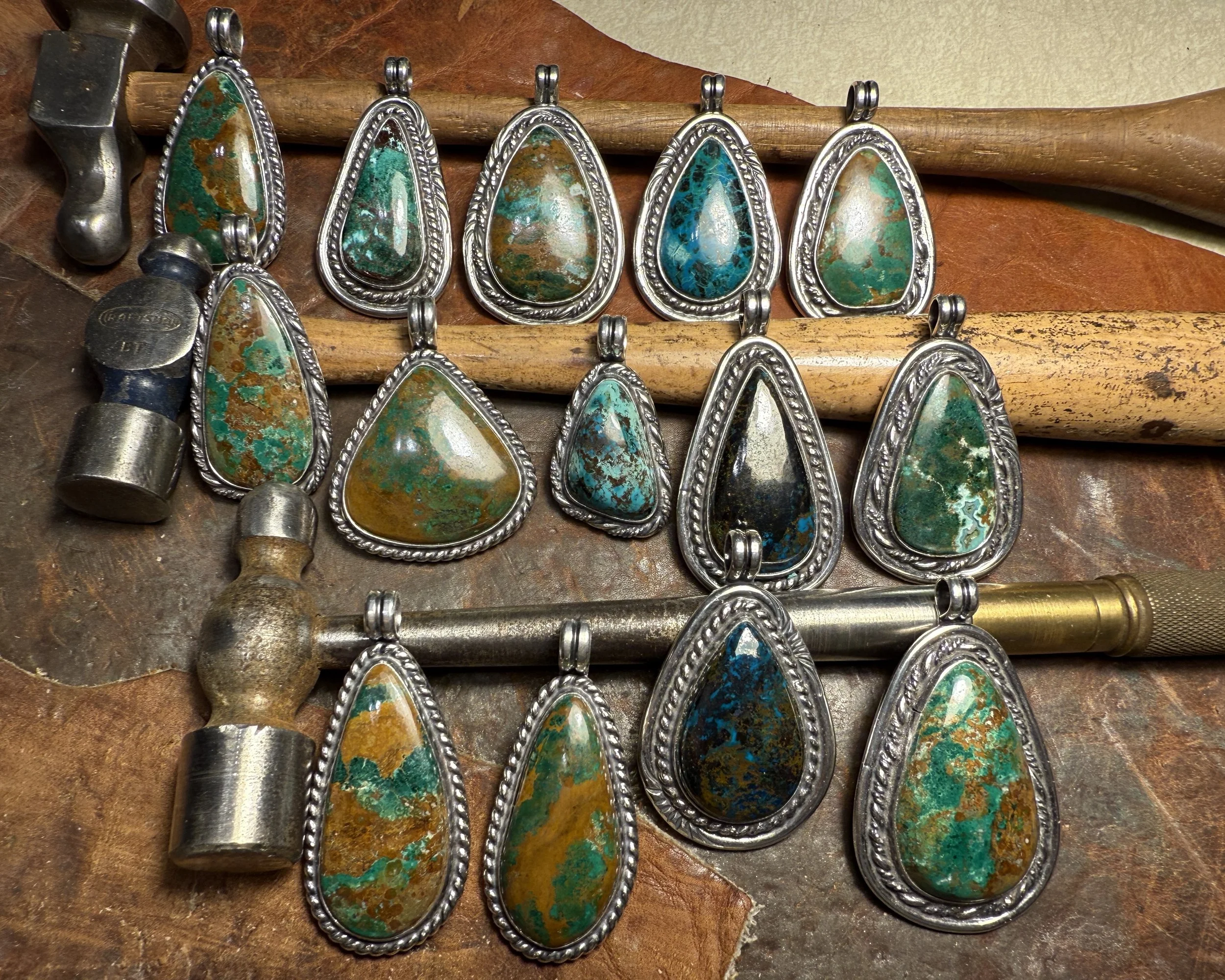 October and November, 2025 - Chrysocolla in sterling silver pendants. This is one of my favorite stones. Like turquoise, it is one of the several gemstones that forms adjacent to copper deposits, and it is often found in the same mines.