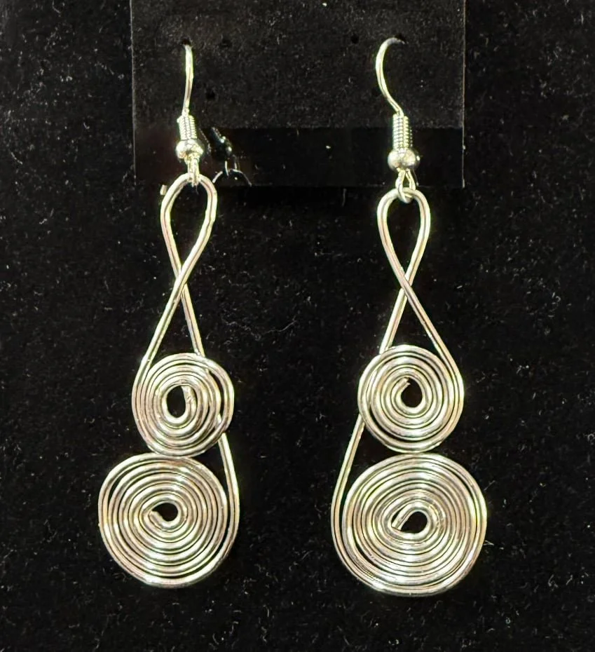 787-26;Earrings;’AgDoubleSpiralingClef’;UniqueHandCraftedFreeFormDesignWithAgRoundWireShapedIntoSmallClossedSpiralOverALargerClosedSpiral;EarHooksAreAgWithBallAndSpring.(1 of 2)
