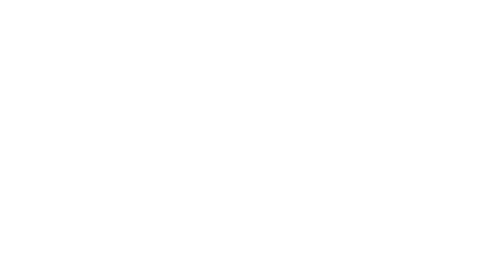 White floral design on black background with symmetrical leaf and petal shapes.