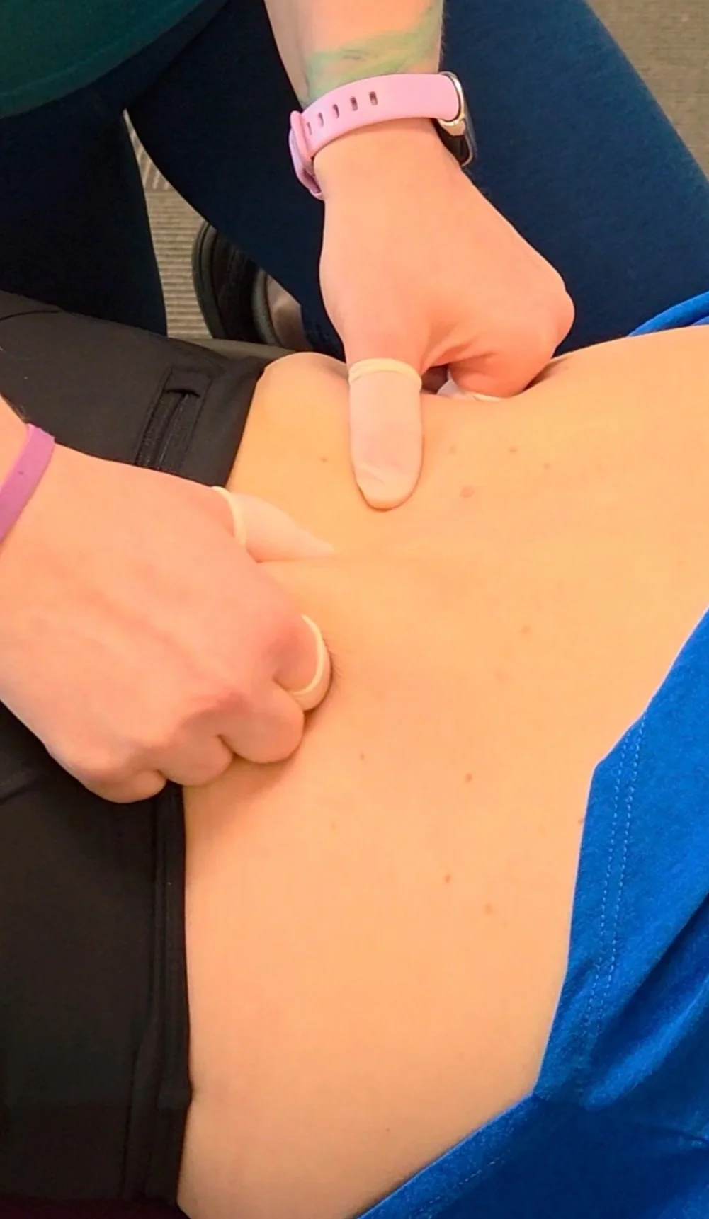 Tiffani Canevari performing targeted bodywork treatment for recurring low back pain at Bodywork Remedies in Santa Rosa, CA.
