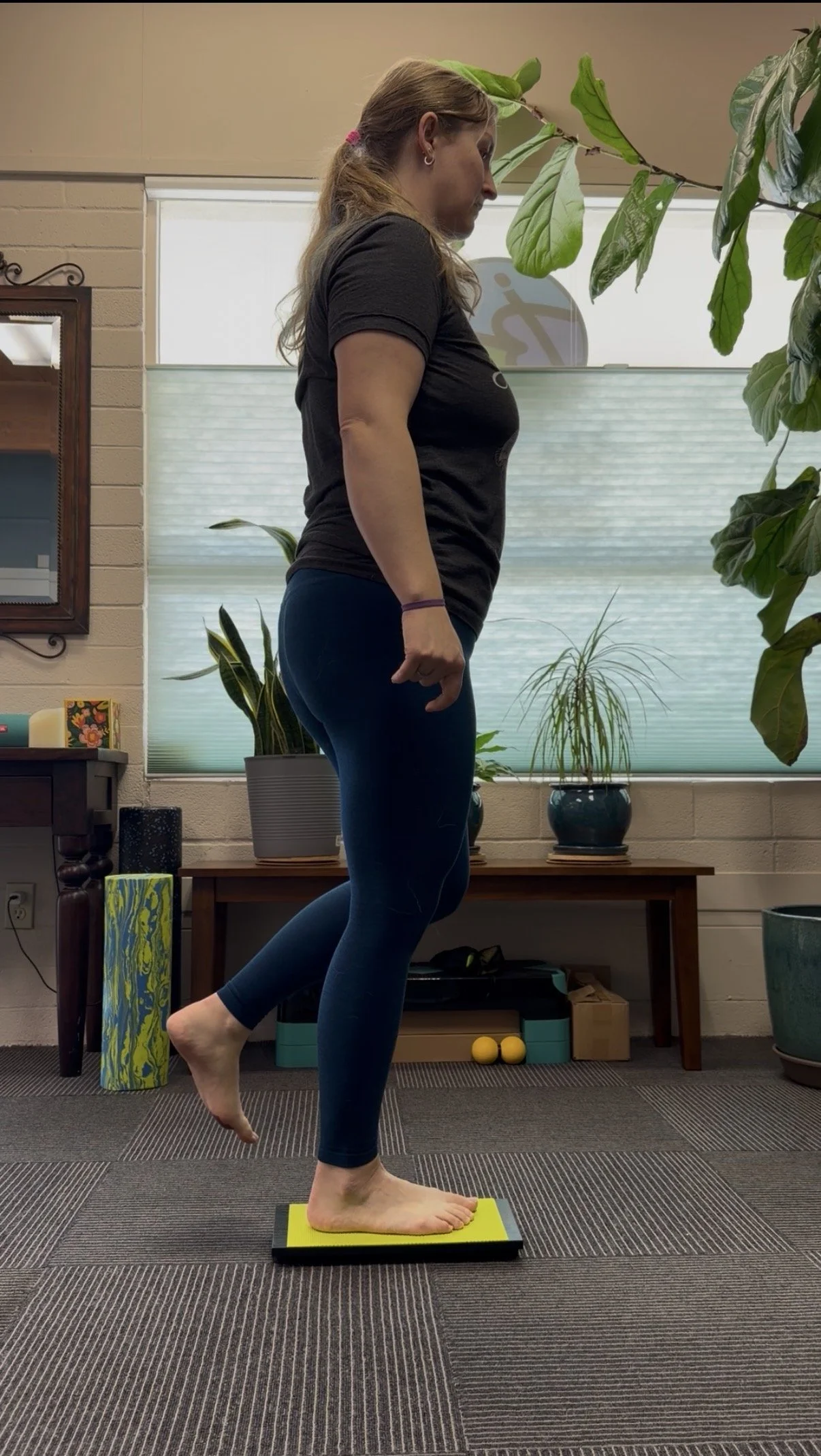 fascia stretch therapist demonstrating mobility tool for balance and ankle strength in Santa Rosa