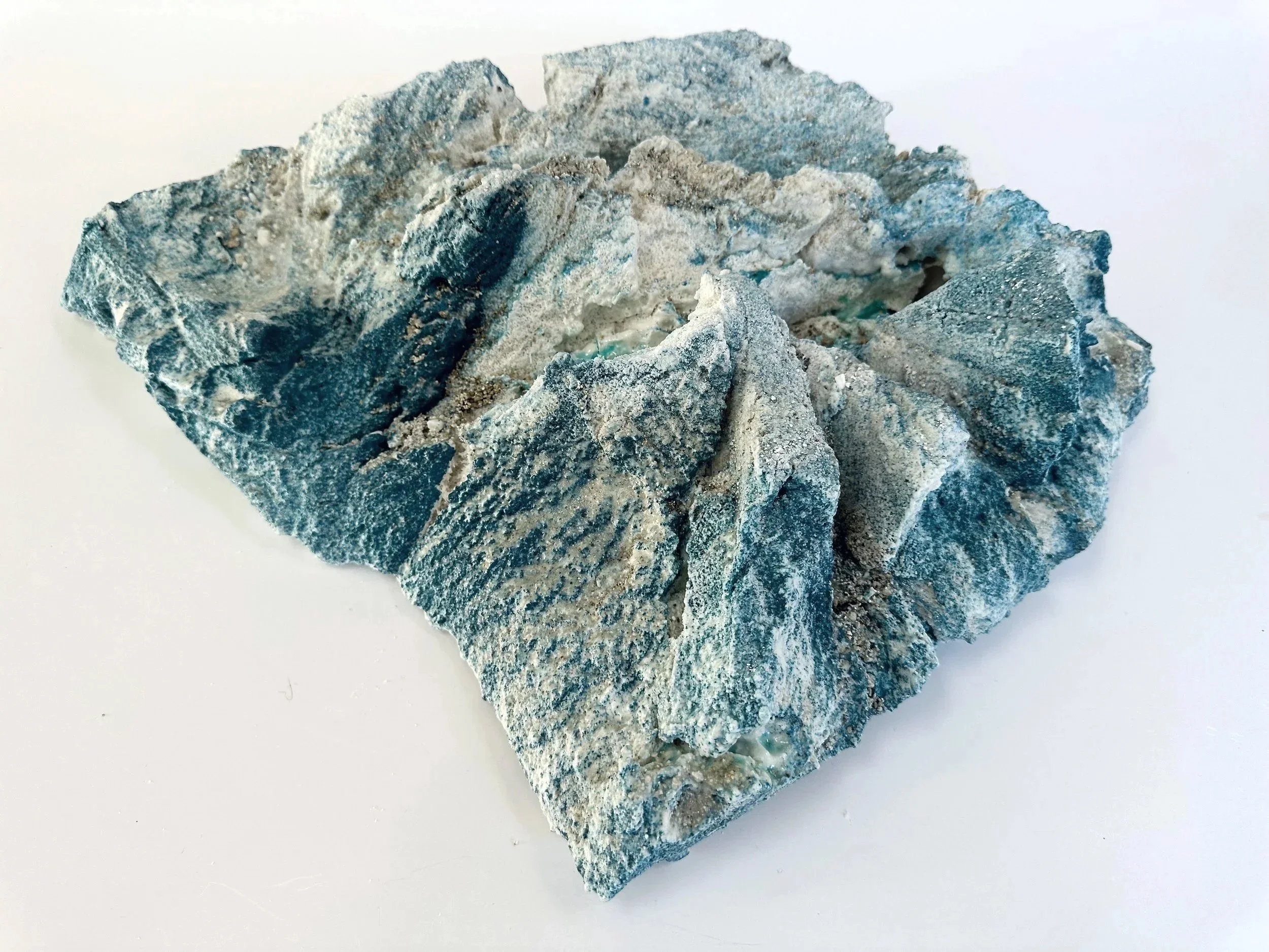 Melt 1 - Finalist Portage 2025 exhibition. Porcelain, dry glaze, stain and glass frit 	
10 x 47 x 39 cm.