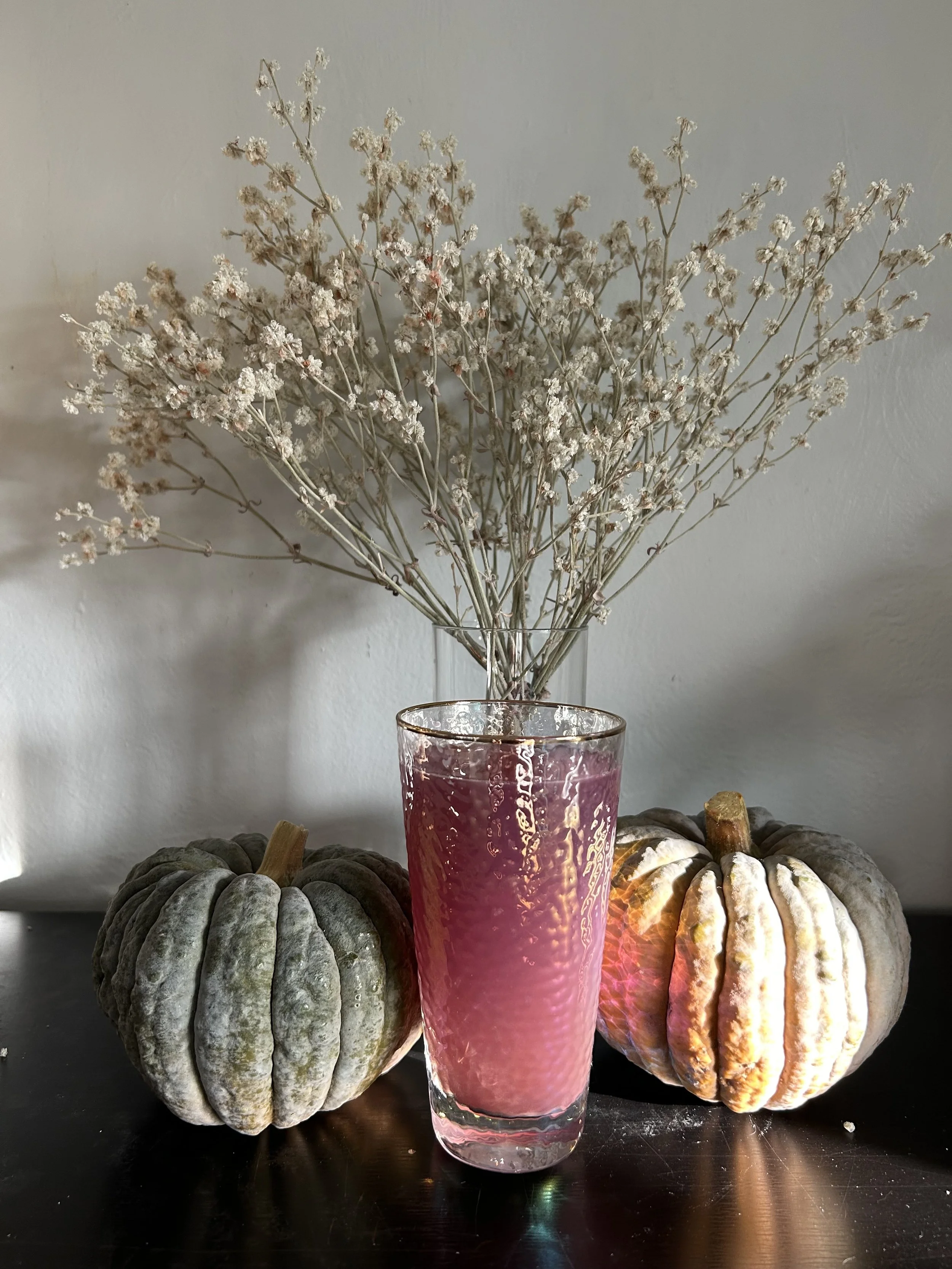 Dhara with pumpkins.jpg