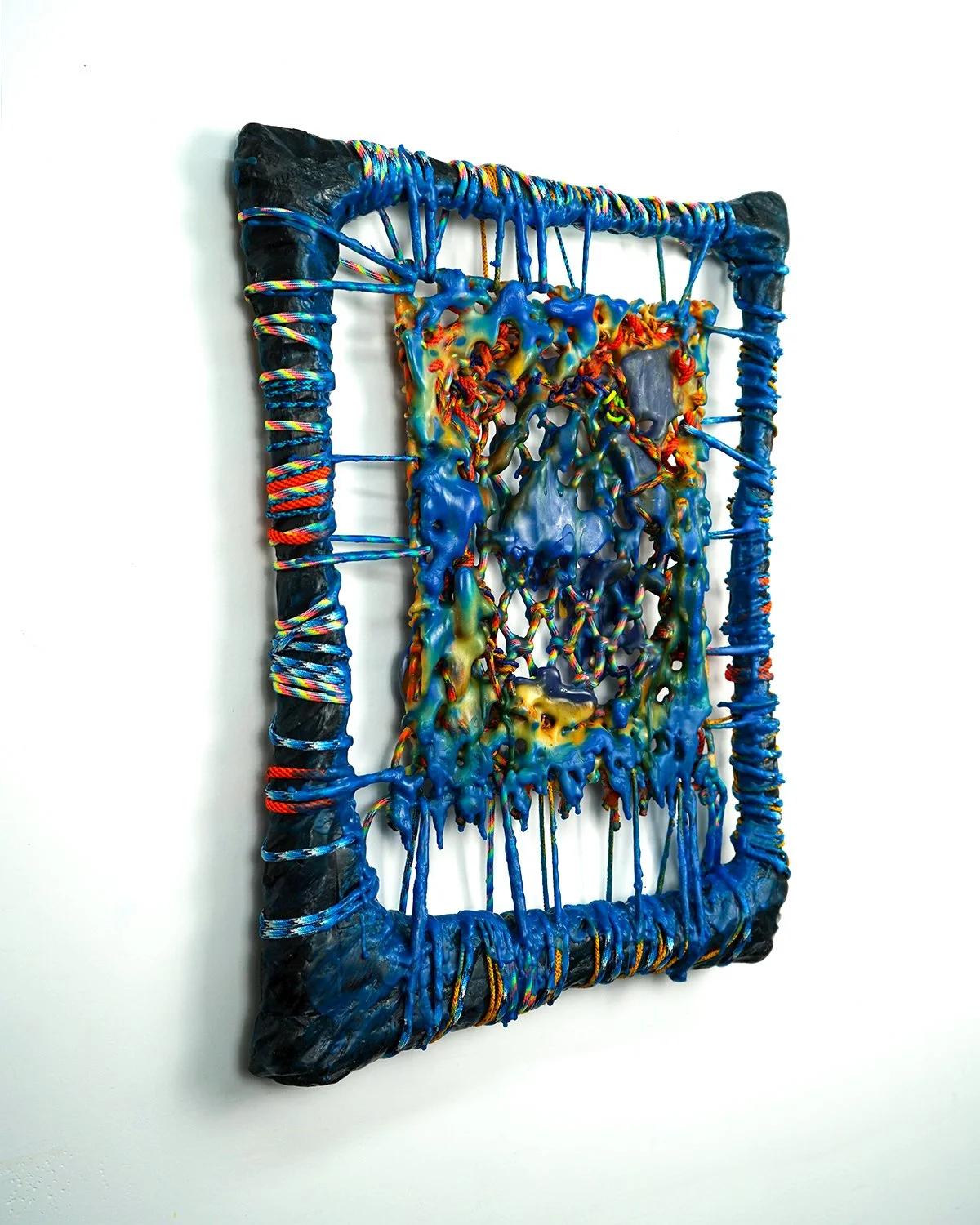  Device for Dreaming, profile , 2025 
Casting wax, encaustic, utility rope, paracord, charred wood 
18 x 14 x 1.5 in