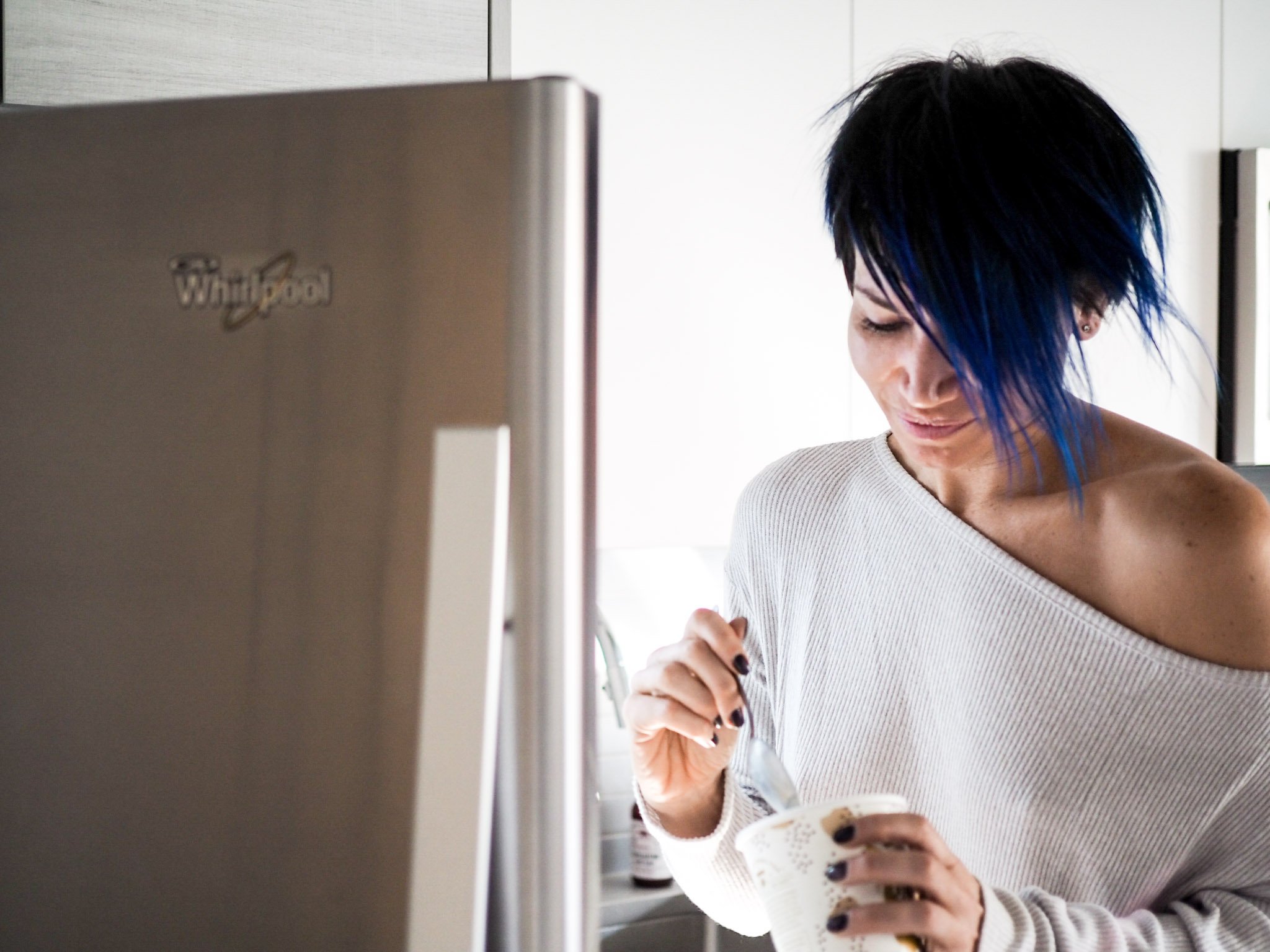 woman eating ice cream from container