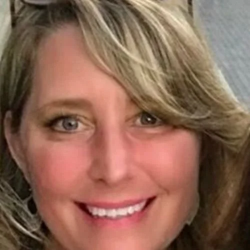 woman with sunglasses smiling