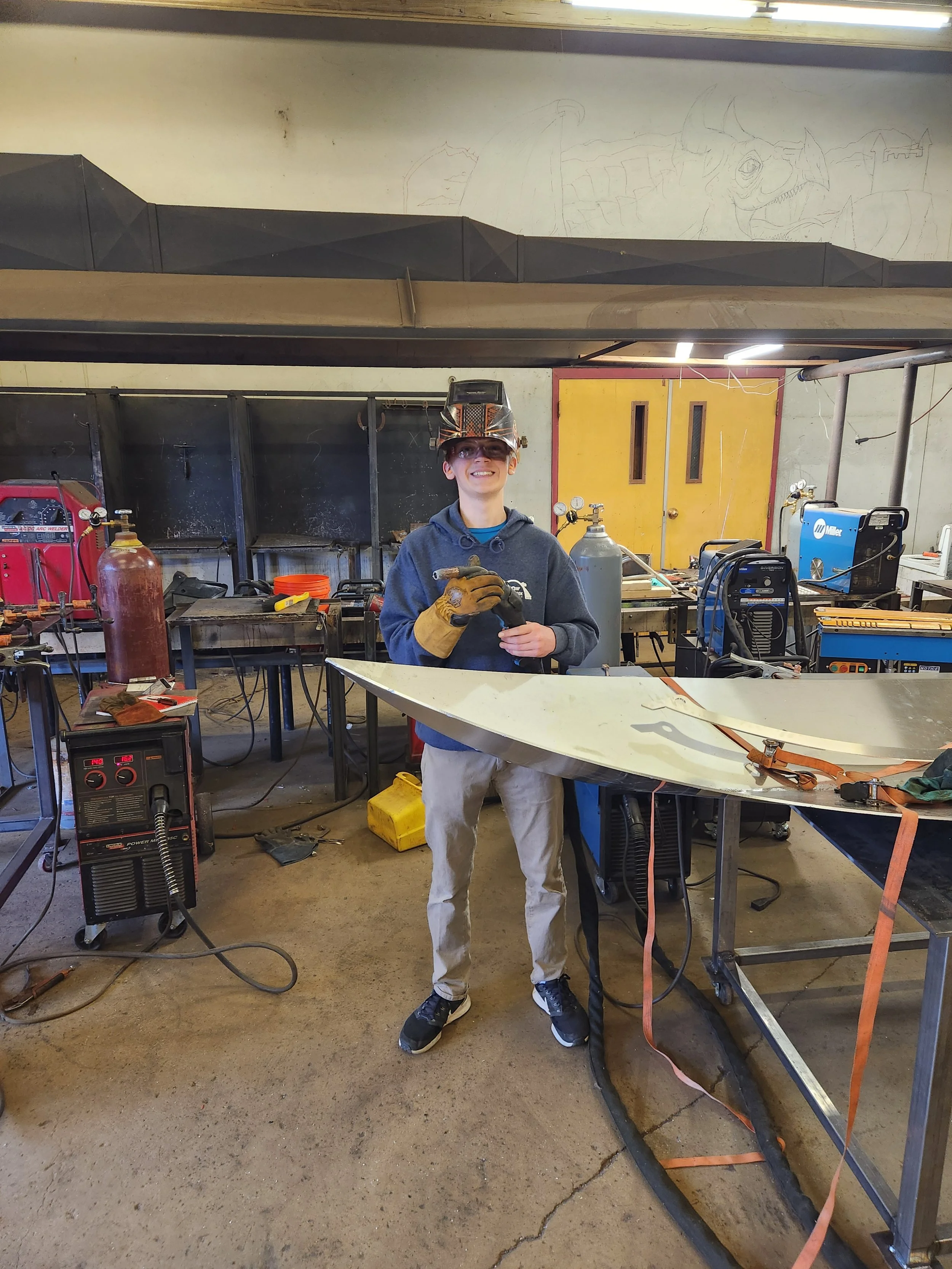 Sebastian standing next to bow..jpg