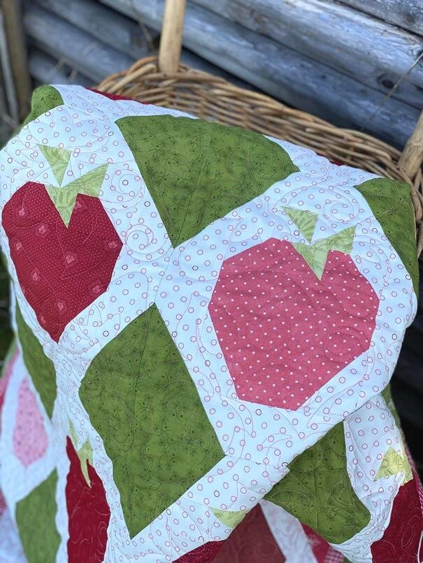 Strawberry ‘Patches’ is made up of all different scrappy berries in a variety of reds and pinks!  So grab your fabric scraps and start picking your berries!!