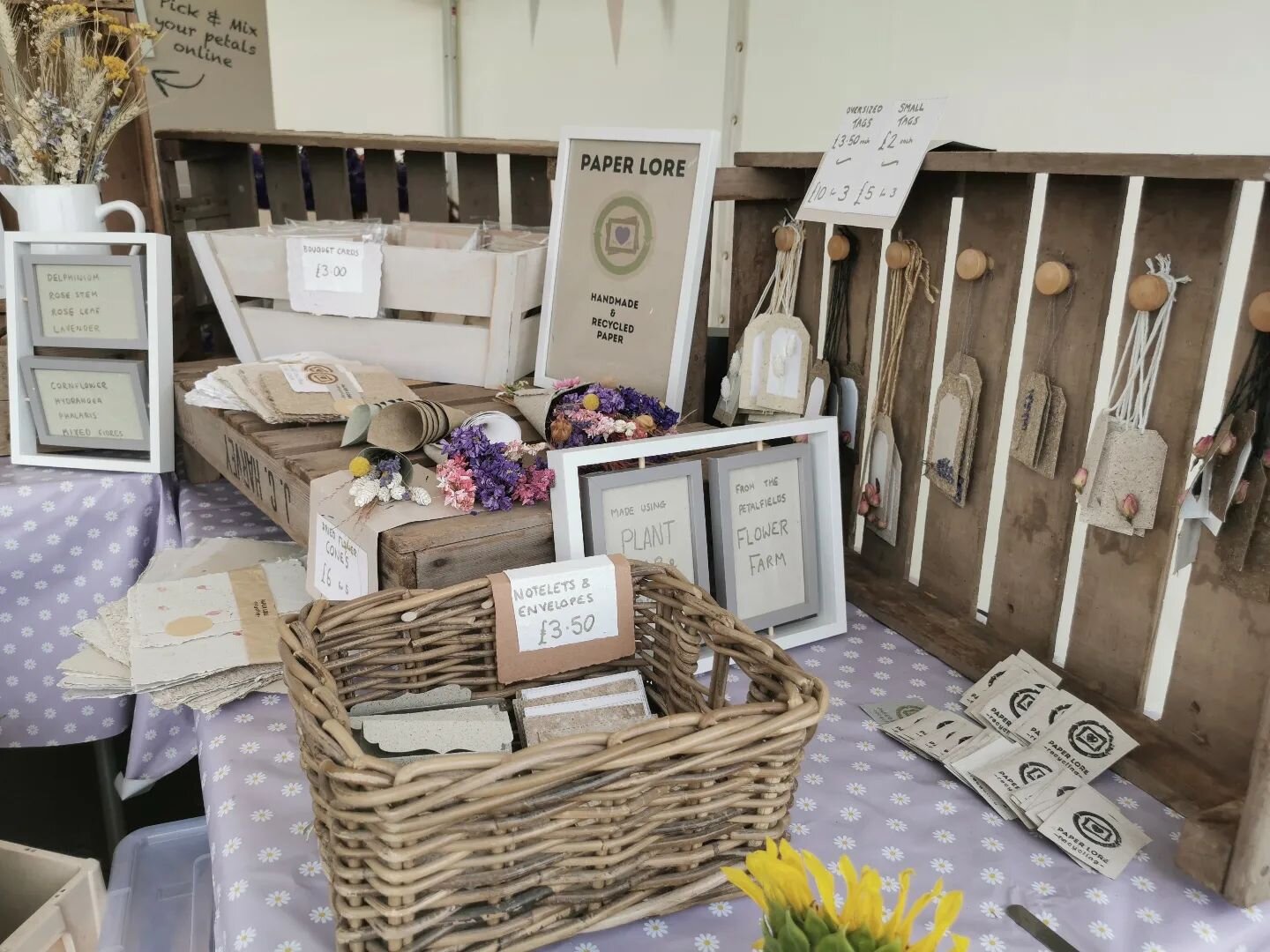A very rainy first Saturday - and we are all set up! People are embracing our summer and arriving to enjoy the flower fields! Paper Lore is all set up and ready to chat to people about turning flower farm waste into paper - enjoy a dry moment in our 
