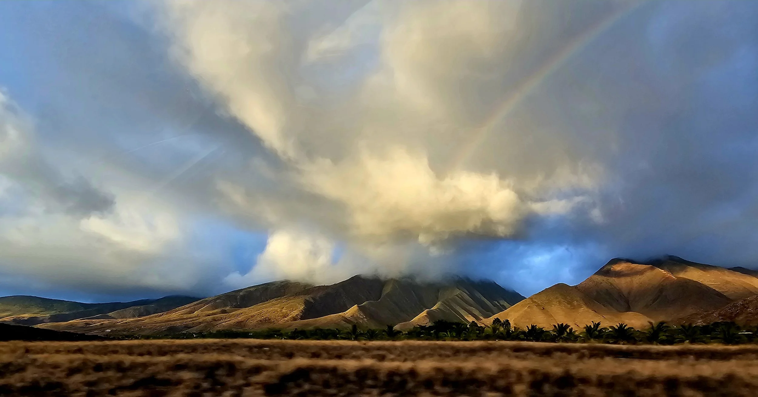 Rain Shower over Western Maui Mountains