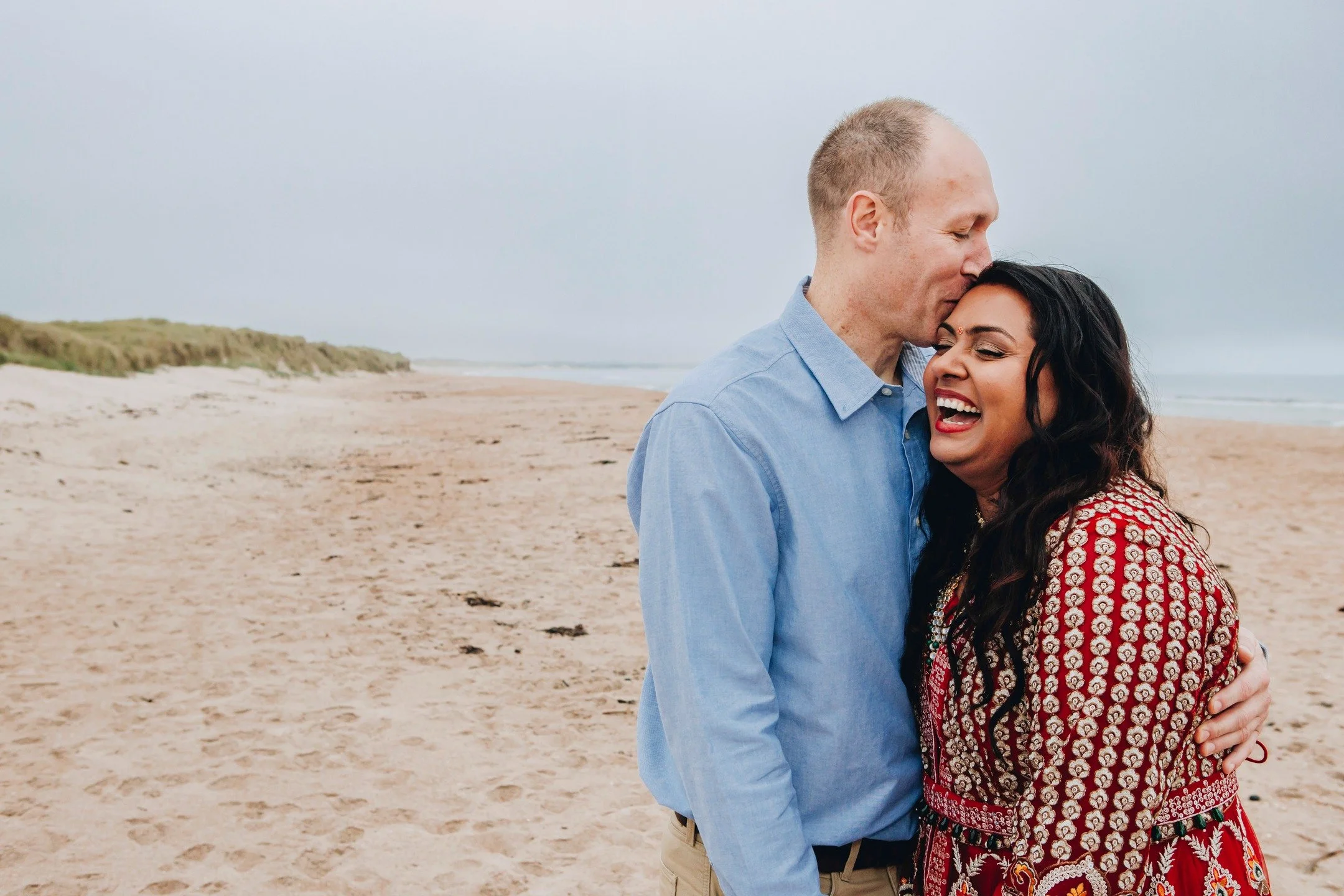 James and Ankita had the CUTEST engagement session at Cresswell beach. We got to play in the dunes, run along the shore, and I didn't fall over - win!

They wanted some natural, fun, romantic images with which to announce their engagement. I think we