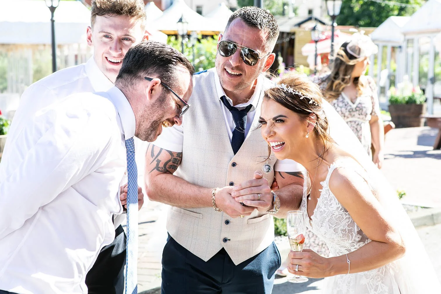 Laughter during a outdoor wedding reception