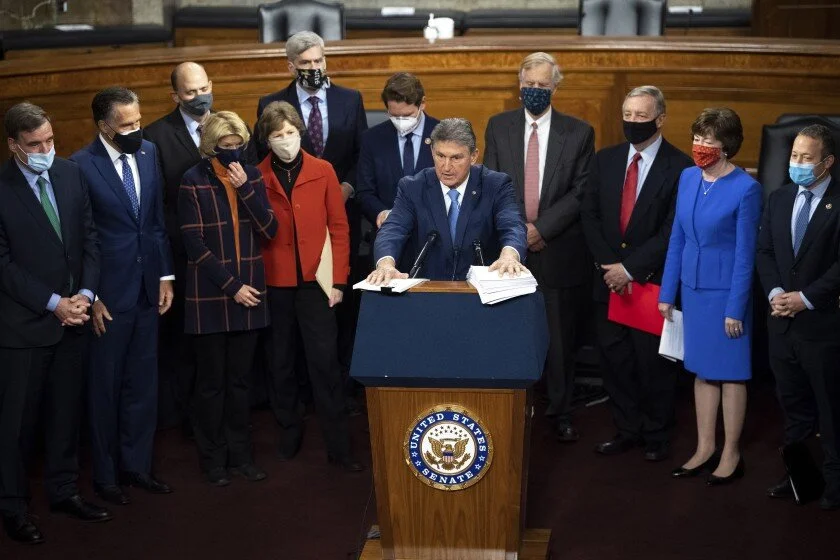 Sen. Joe Manchin, D-W.Va., speaks during a news conference with a bipartisan group of lawmakers to unveil a proposal for a COVID-19 relief bill.    (Caroline Brehman / CQ-Roll Call)