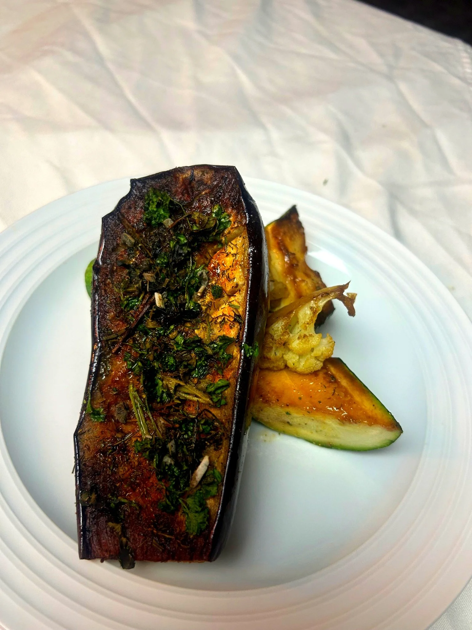 Vegan Protein: Herb Grilled Vegan Steak with Grilled Zucchini and Steam Cauliflower served with Tzatziki Sauce