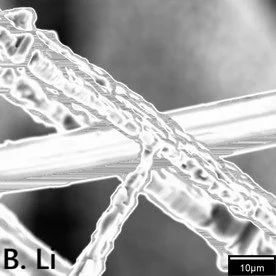 When a dendrate crystal meets another one during supercooling